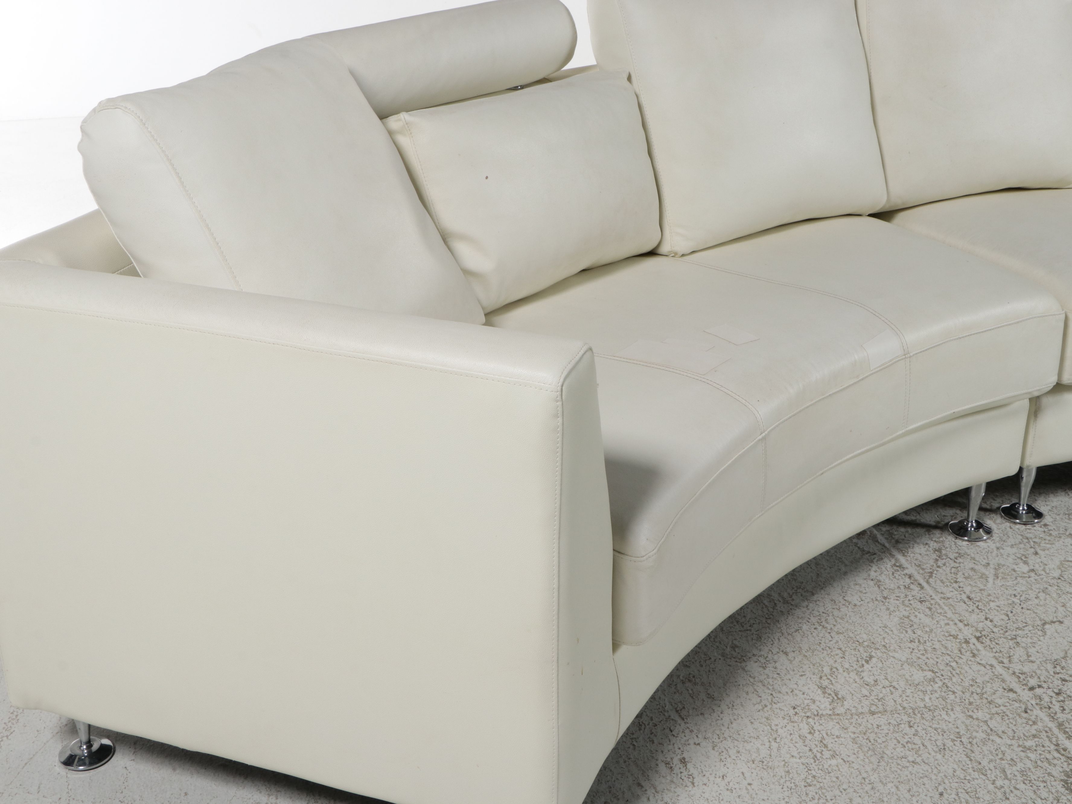 Contemporary White Bonded Leather Curved Sectional Sofa and Ottoman