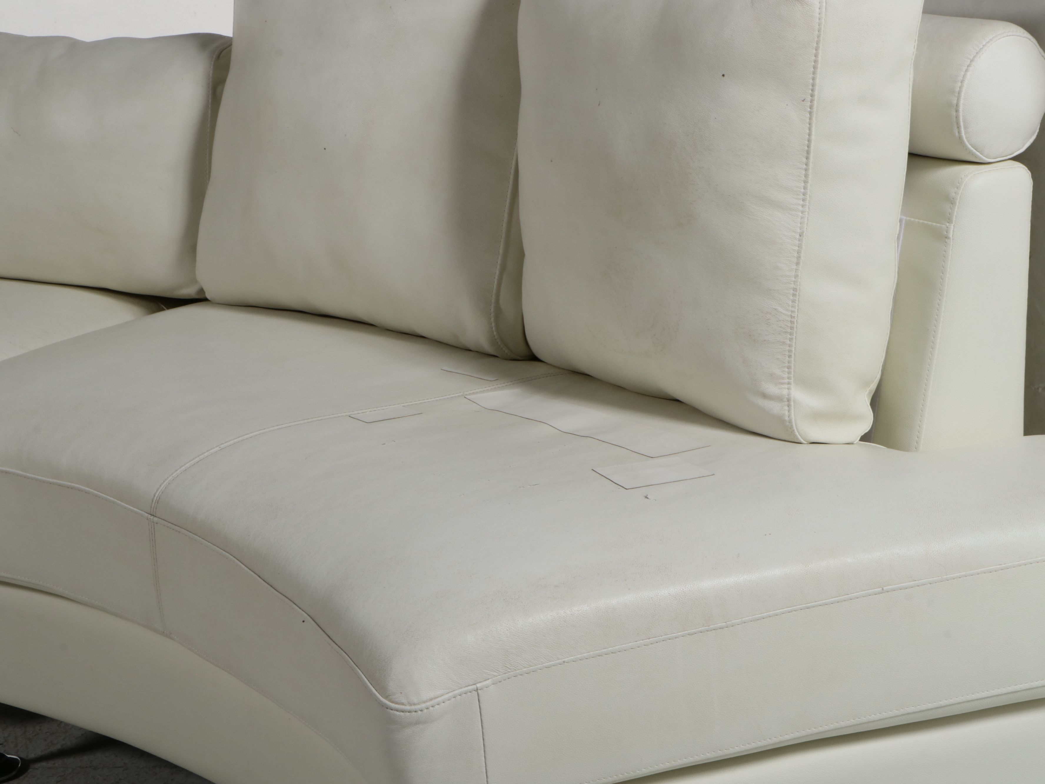 Contemporary White Bonded Leather Curved Sectional Sofa and Ottoman