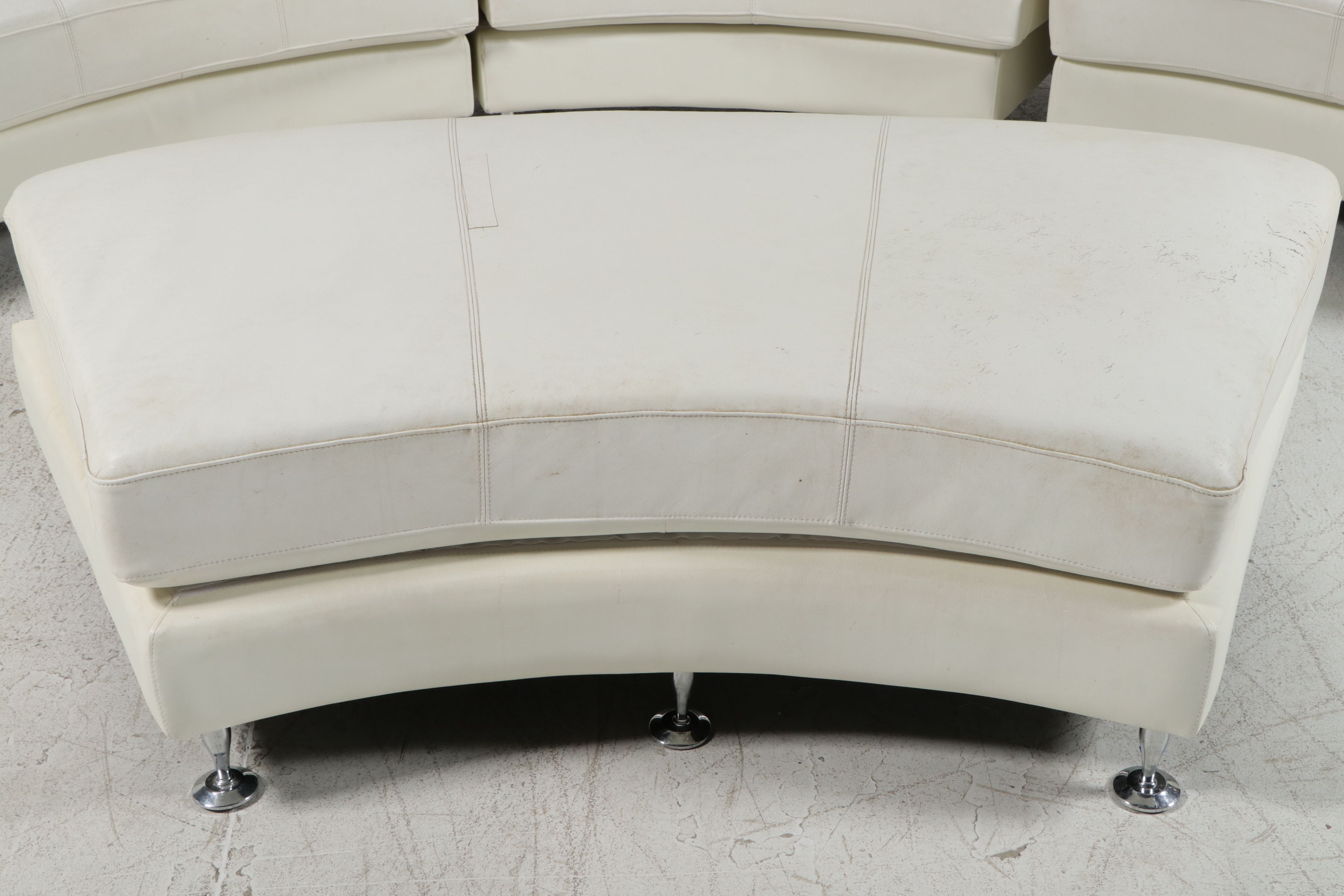 Contemporary White Bonded Leather Curved Sectional Sofa and Ottoman