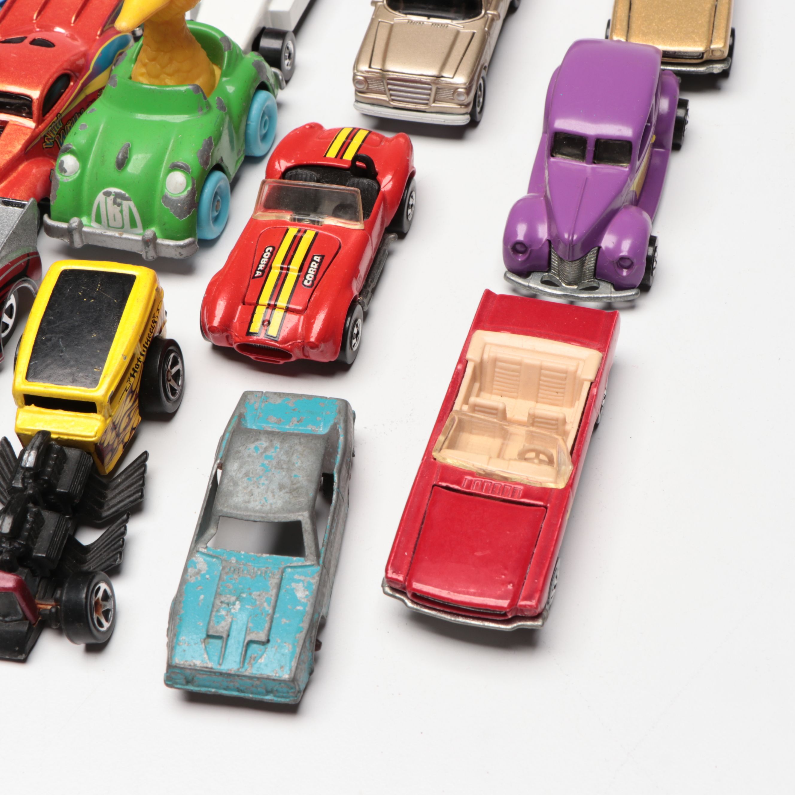 Hot Wheels and Other Diecast Vehicles and Toys with Model Train Display