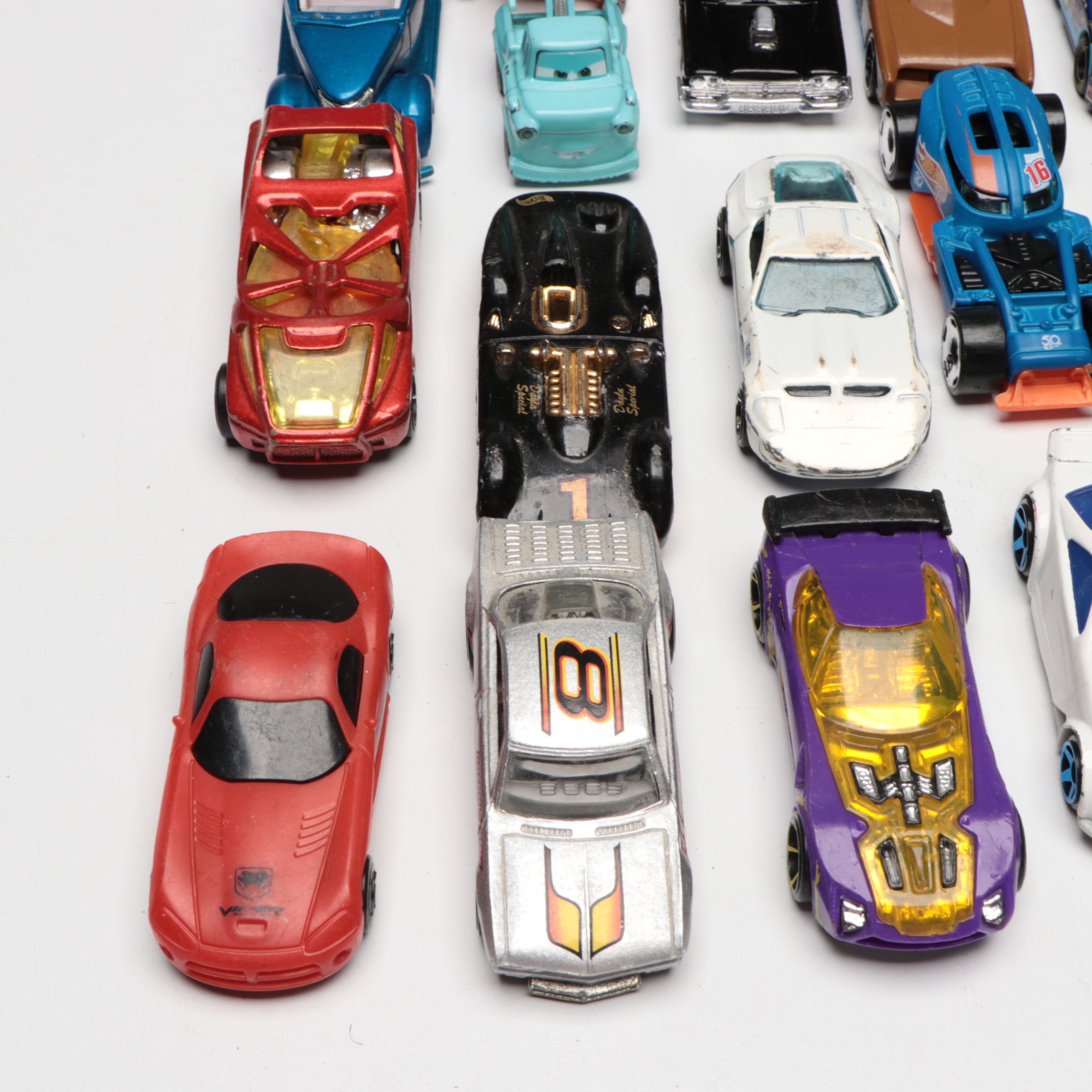 Hot Wheels and Other Diecast Vehicles and Toys with Model Train Display