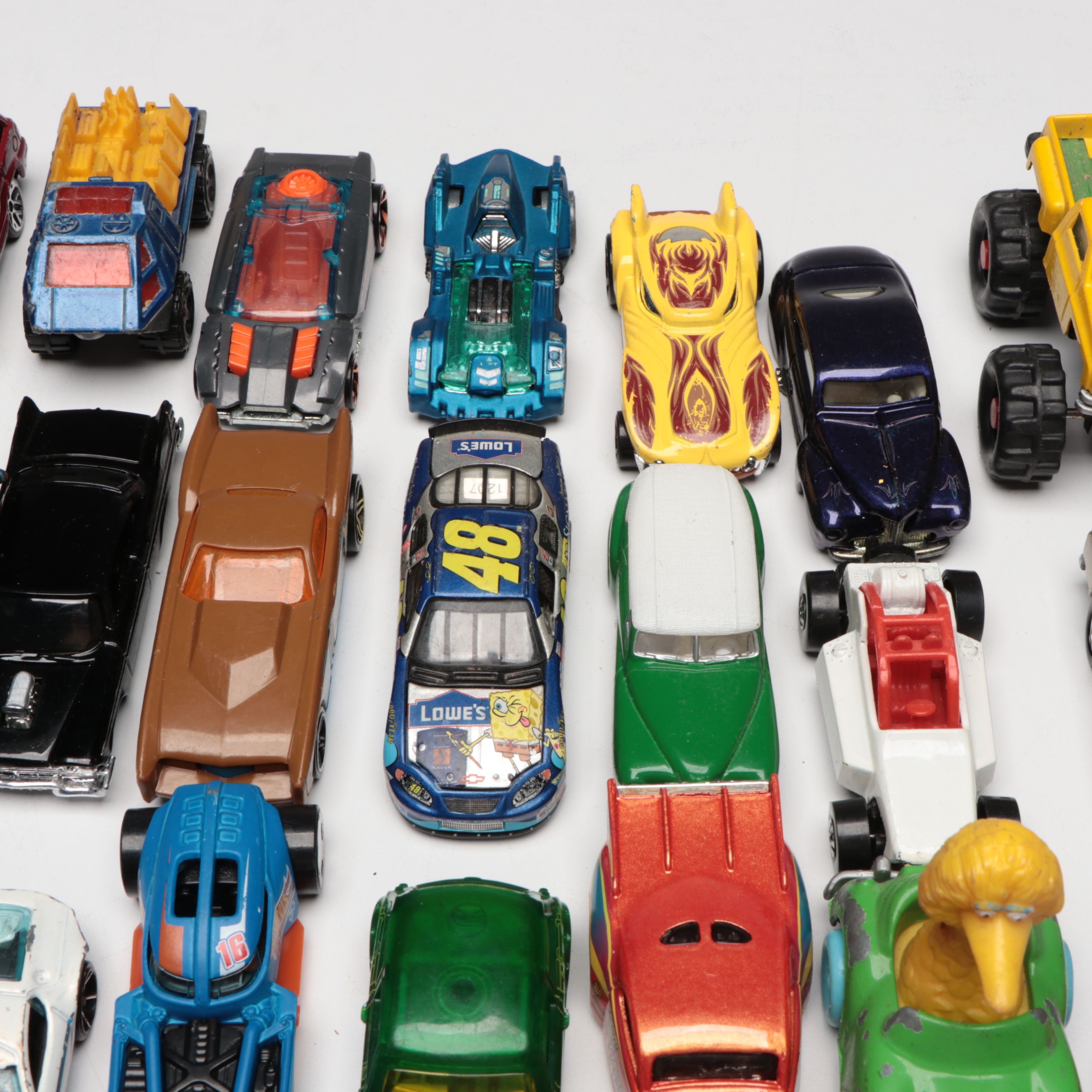 Hot Wheels and Other Diecast Vehicles and Toys with Model Train Display