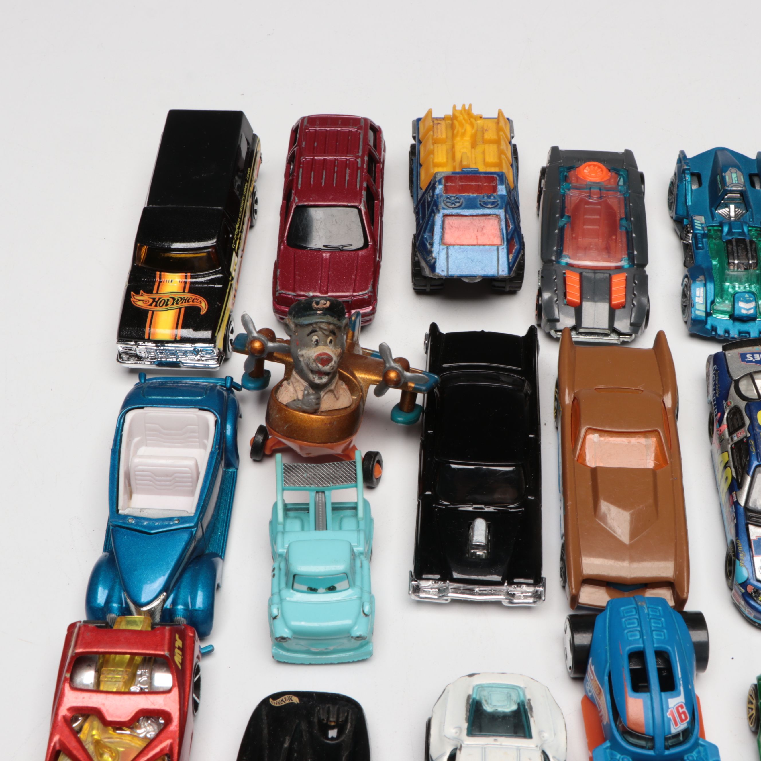 Hot Wheels and Other Diecast Vehicles and Toys with Model Train Display