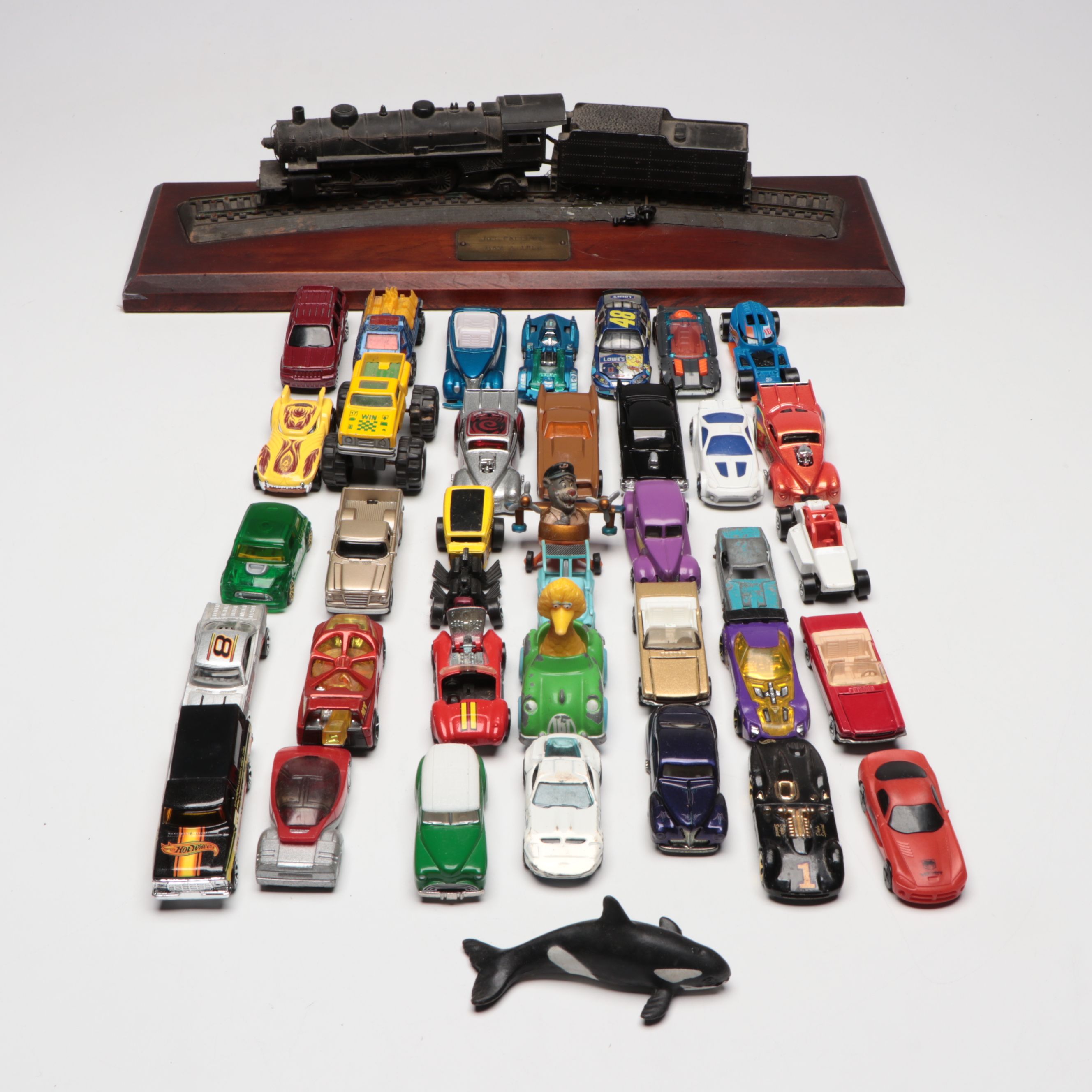 Hot Wheels and Other Diecast Vehicles and Toys with Model Train Display