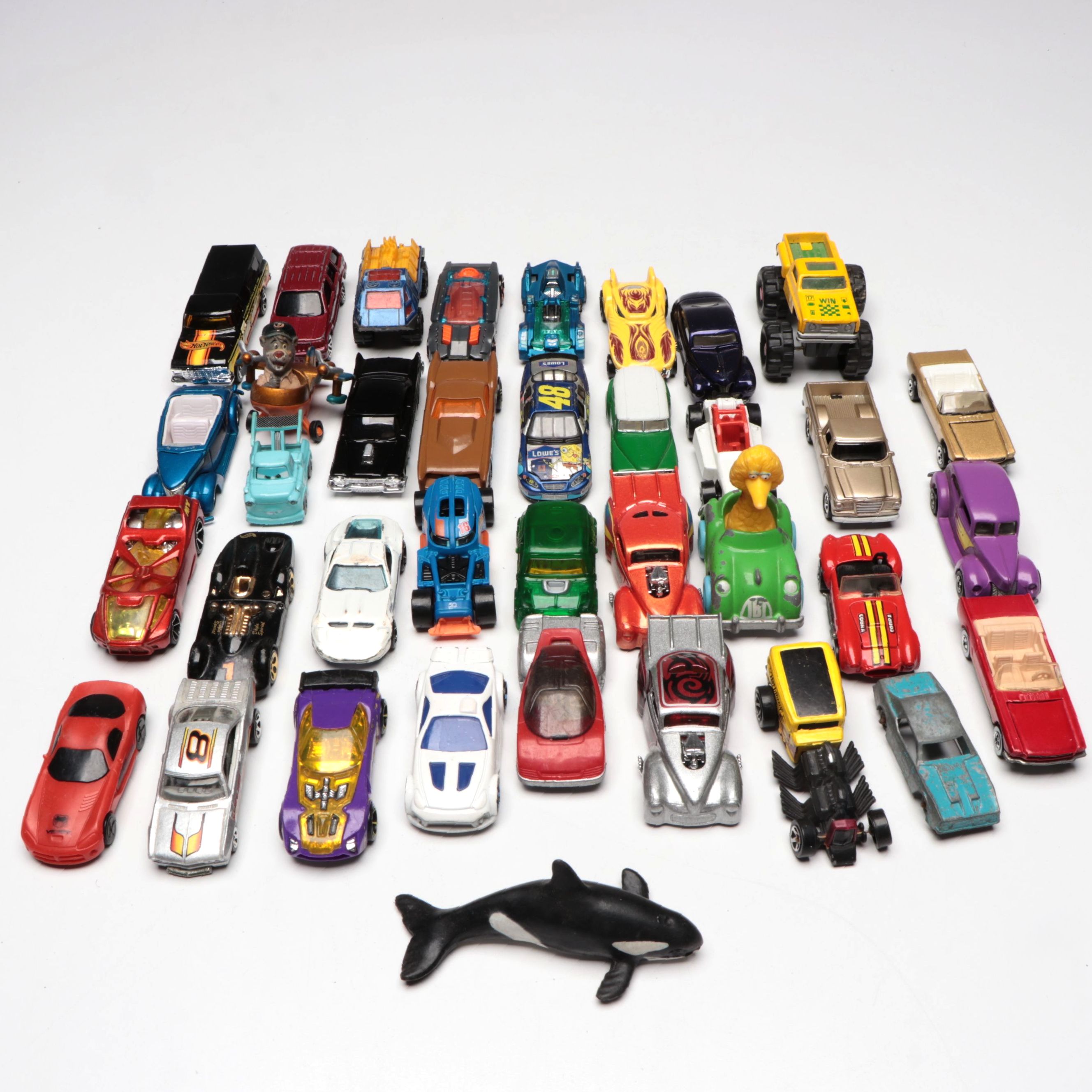 Hot Wheels and Other Diecast Vehicles and Toys with Model Train Display
