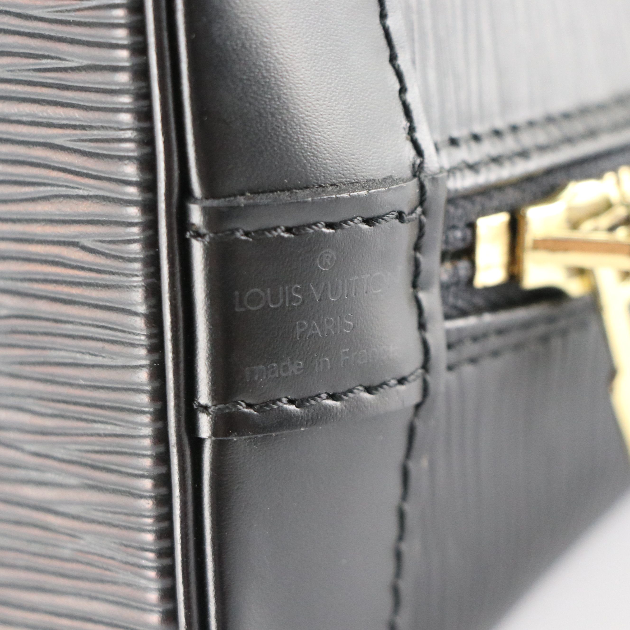 Louis Vuitton Alma PM Handbag in Black Epi and Smooth Leather