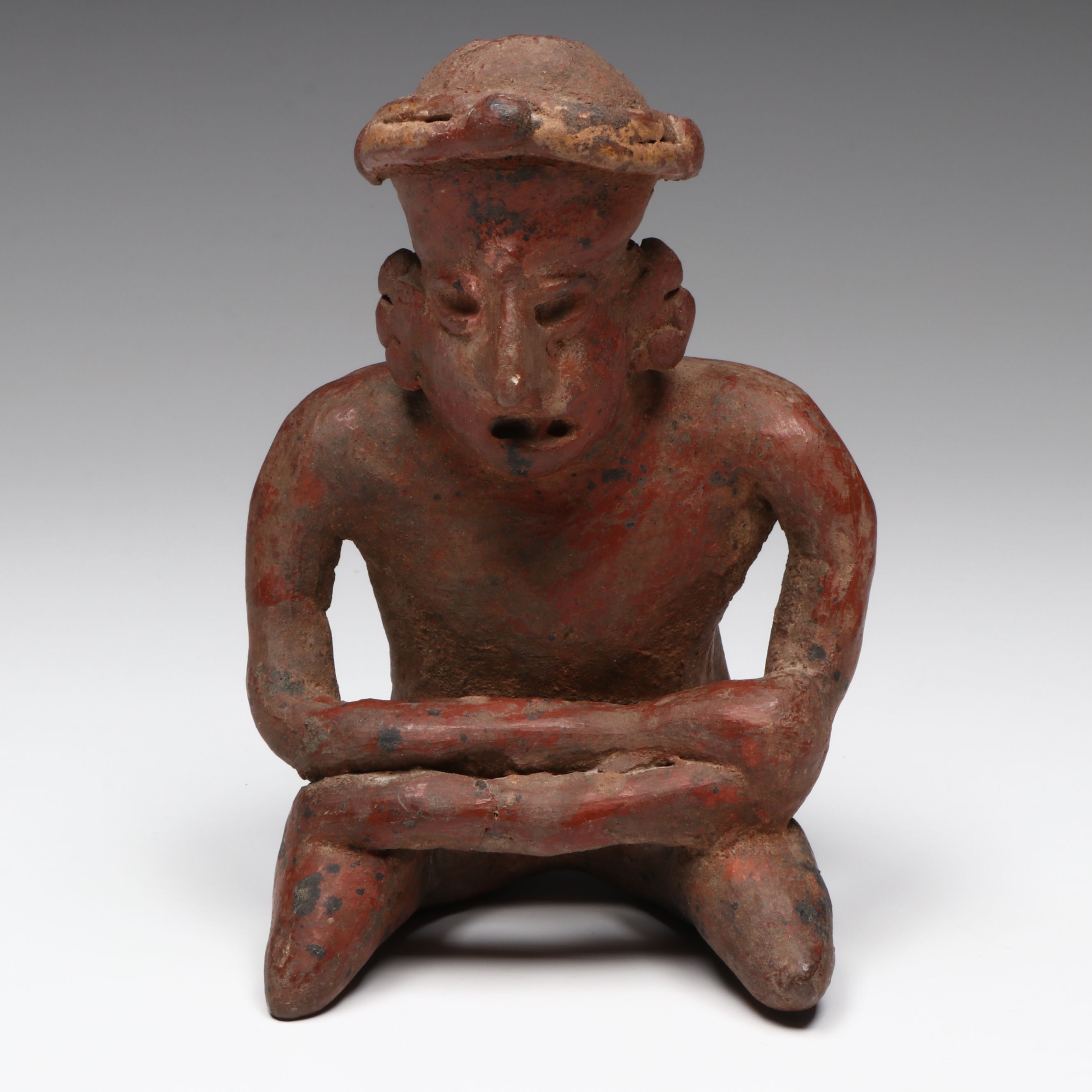 Pre-Columbian Nayarit Polychrome Seated Male, Circa 200 BCE–200 CE