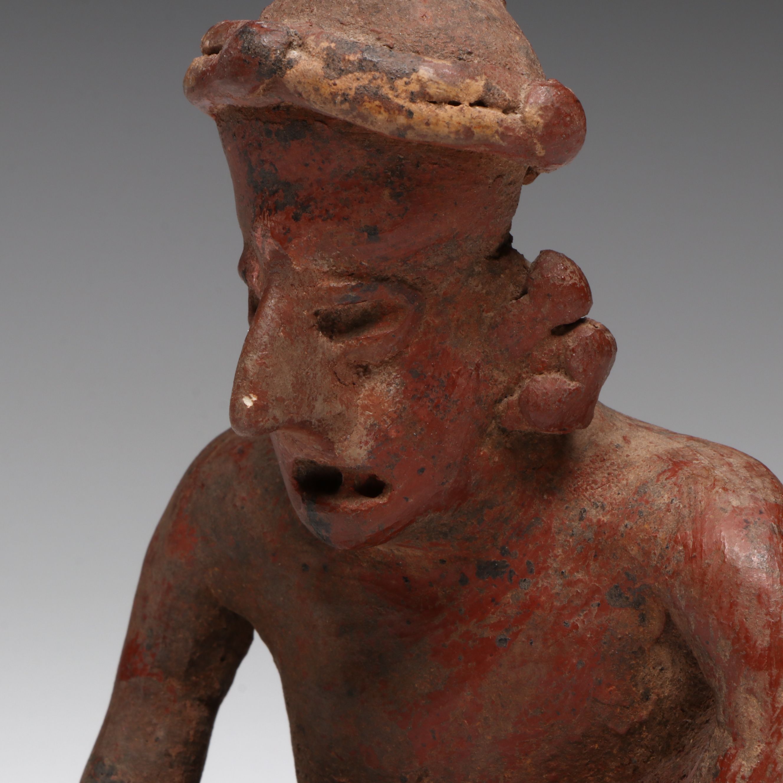Pre-Columbian Nayarit Polychrome Seated Male, Circa 200 BCE–200 CE