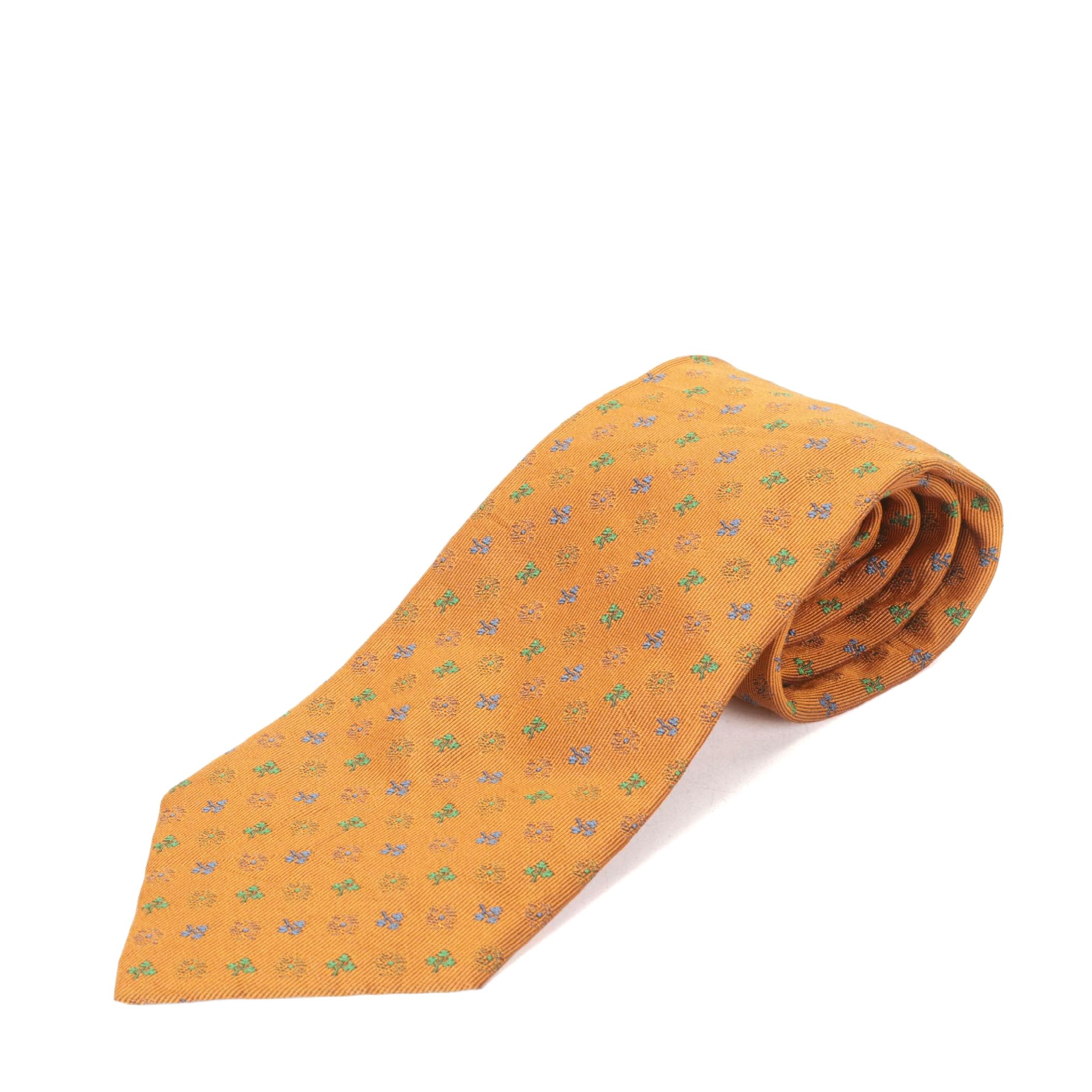 Hermès Silk Necktie in Burnt Orange with Stem and Flower Print