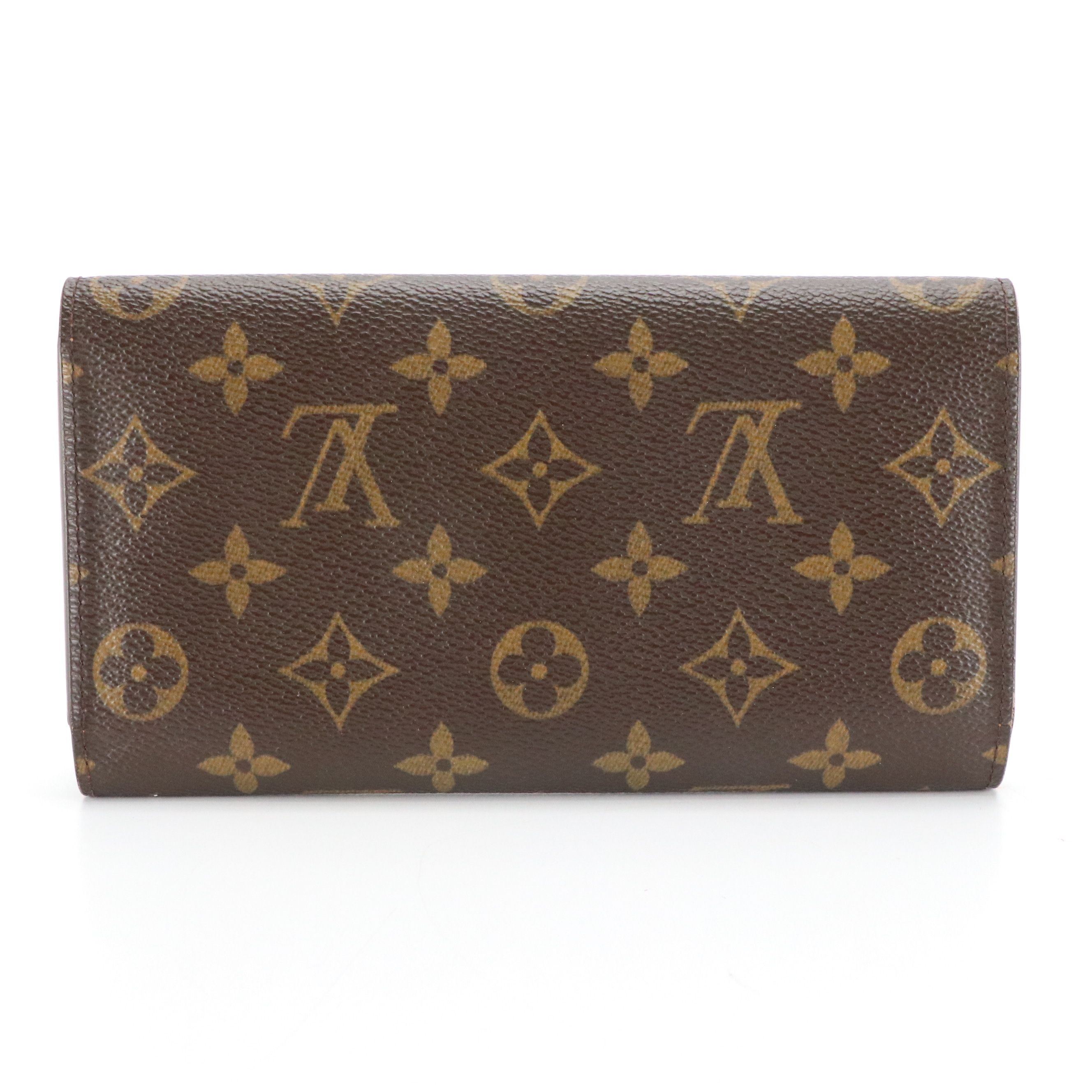 Louis Vuitton Porte-Trésor International in Monogram Canvas