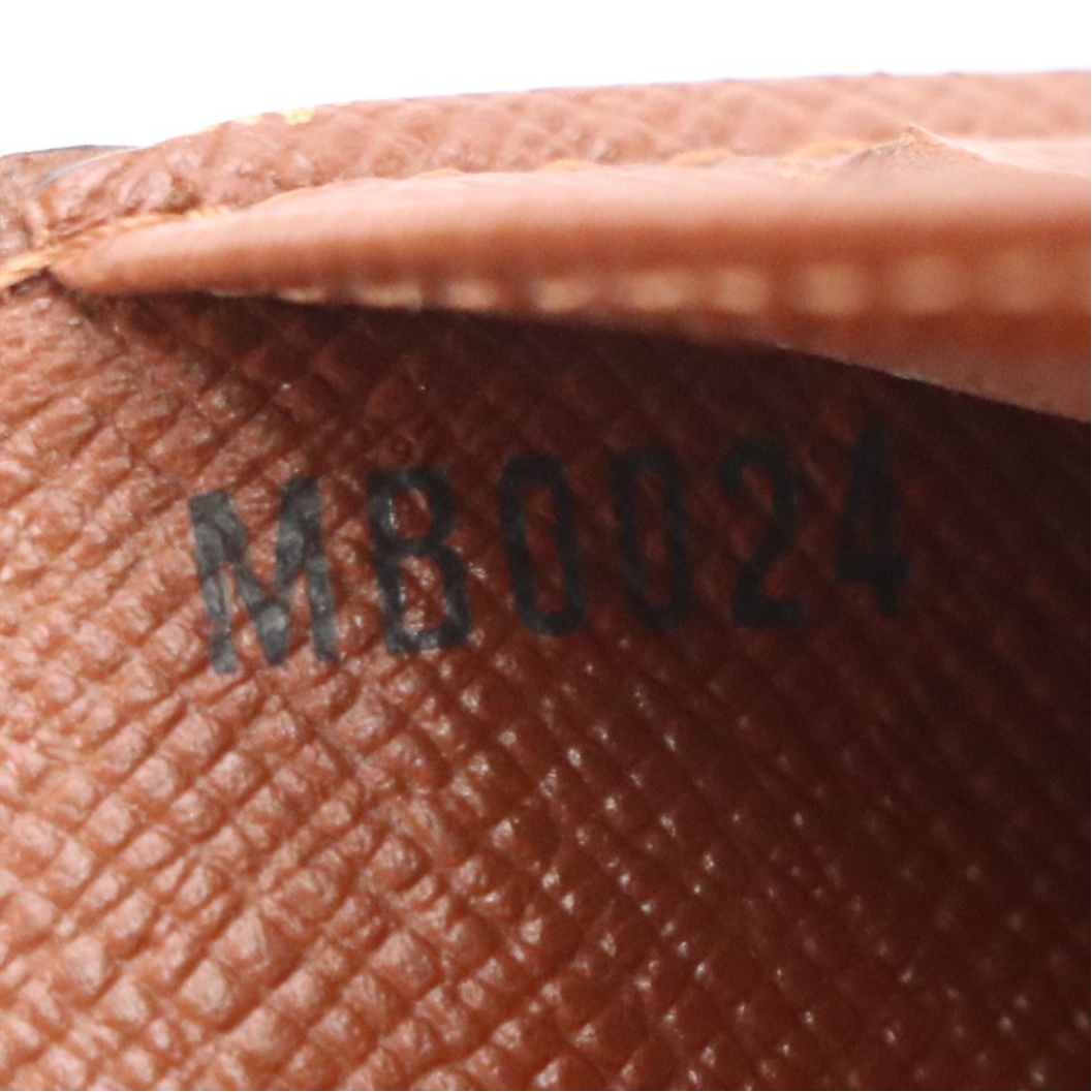 Louis Vuitton Porte-Trésor International in Monogram Canvas