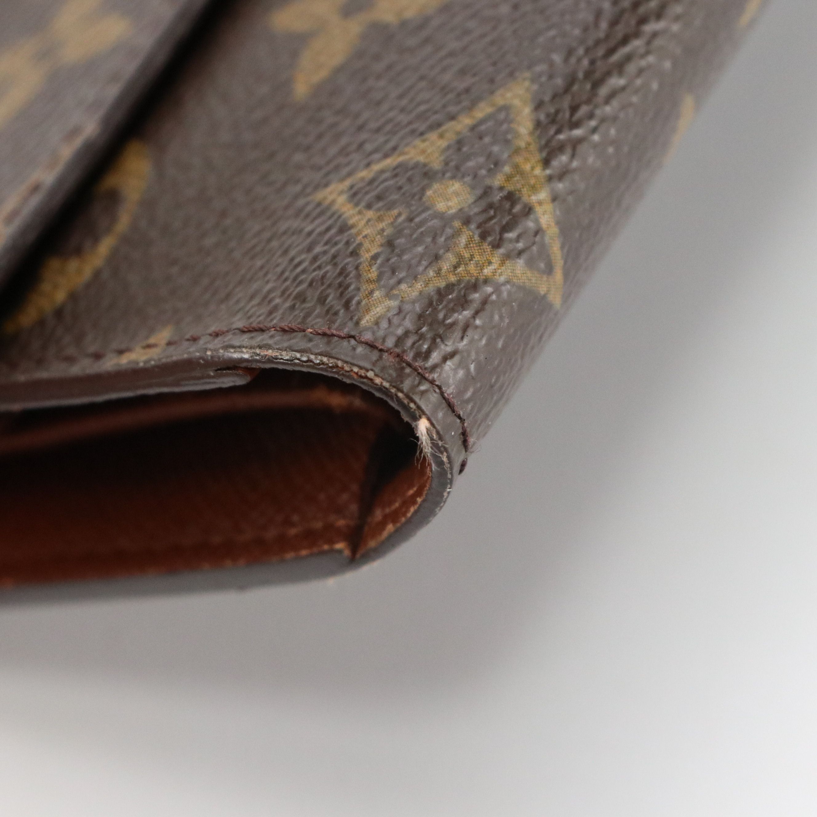 Louis Vuitton Porte-Trésor International in Monogram Canvas