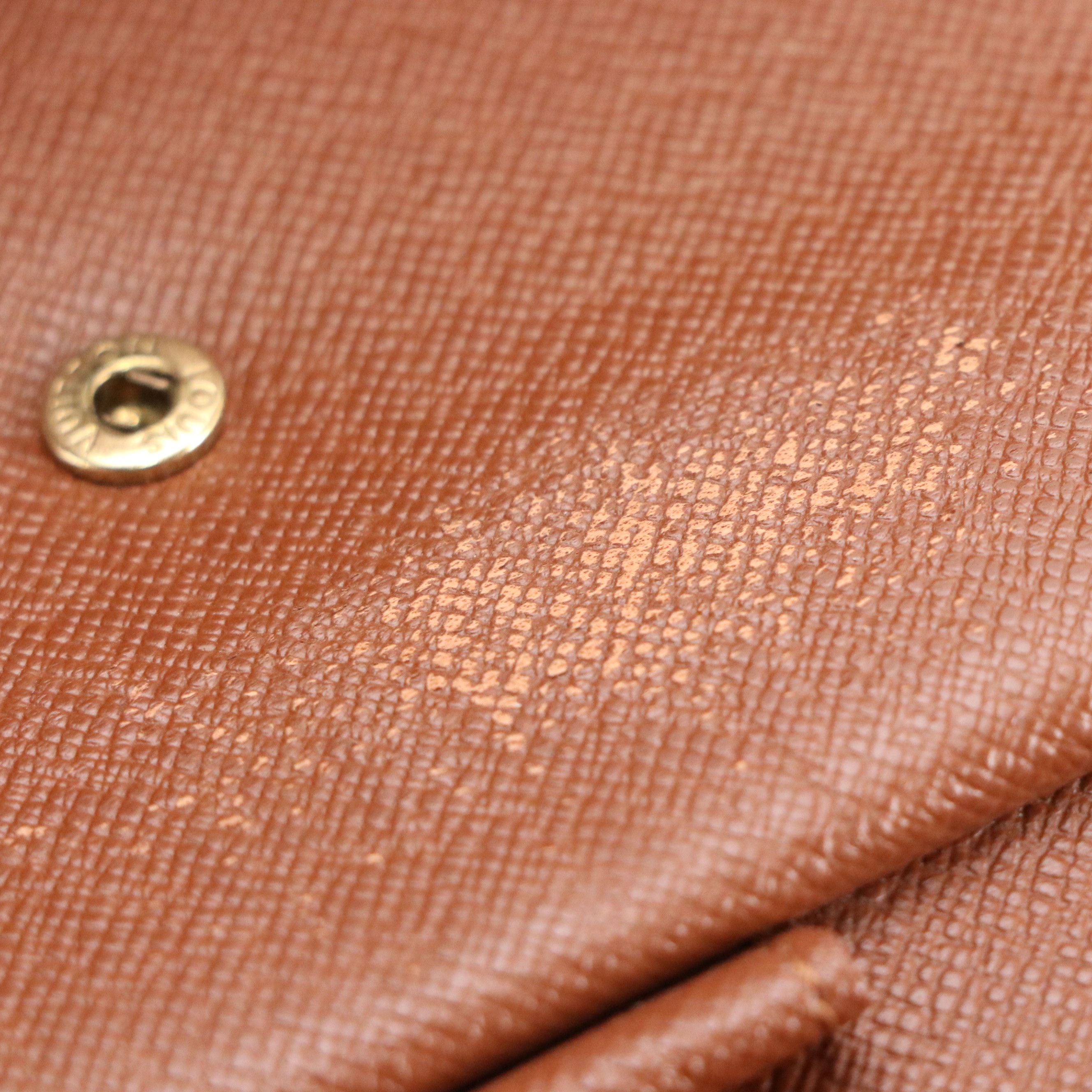 Louis Vuitton Porte-Trésor International in Monogram Canvas