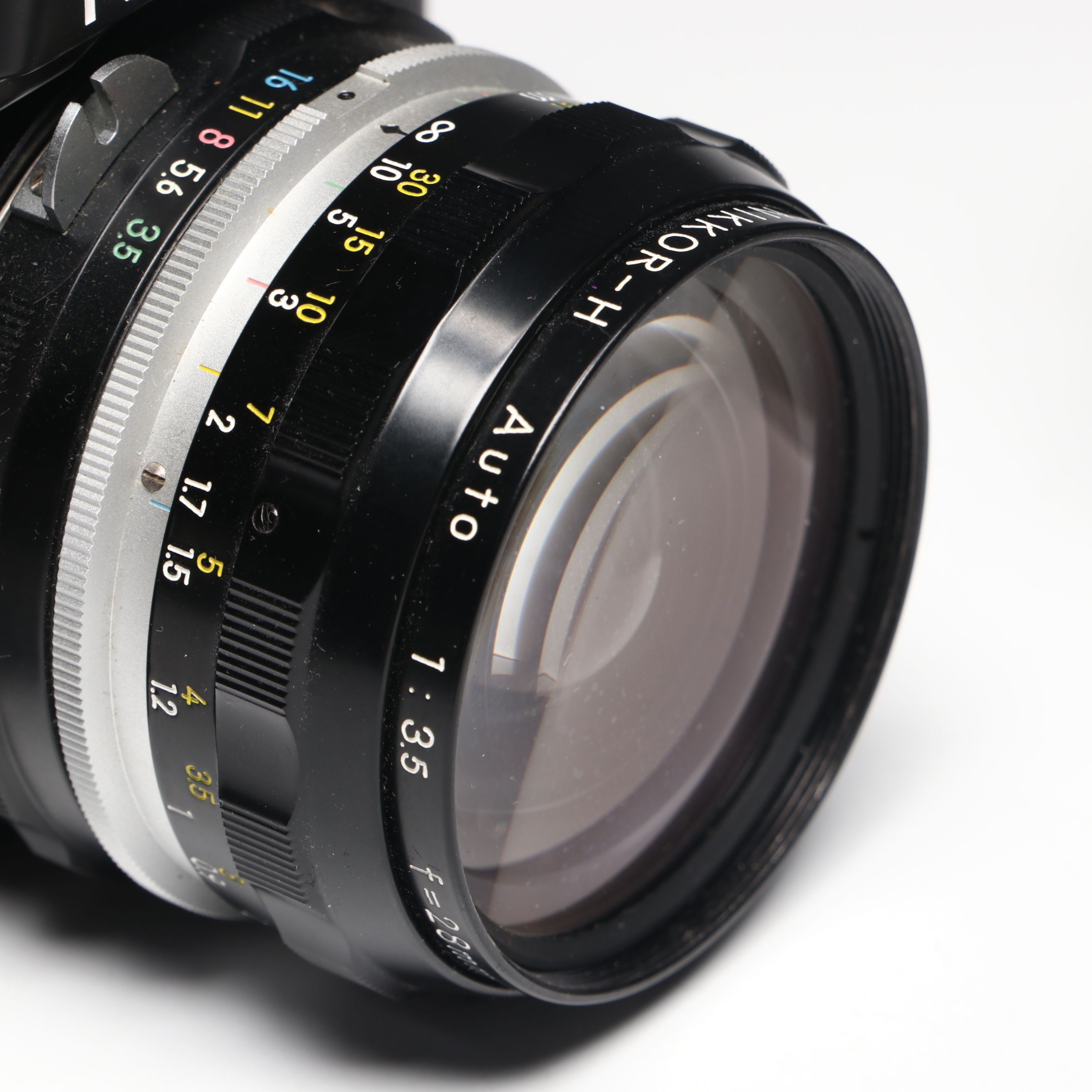 Nikon F, Nikon FE, Nikon FM Camera Bodies with Various Lenses