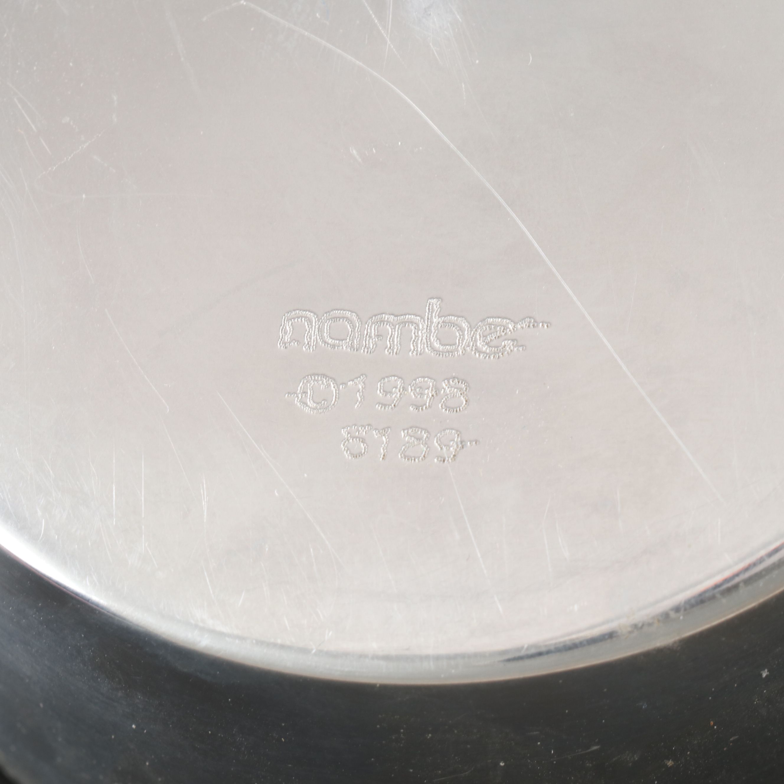 Nambé "Flare" Candlesticks and "Spiral" Wine Coaster, 1990s