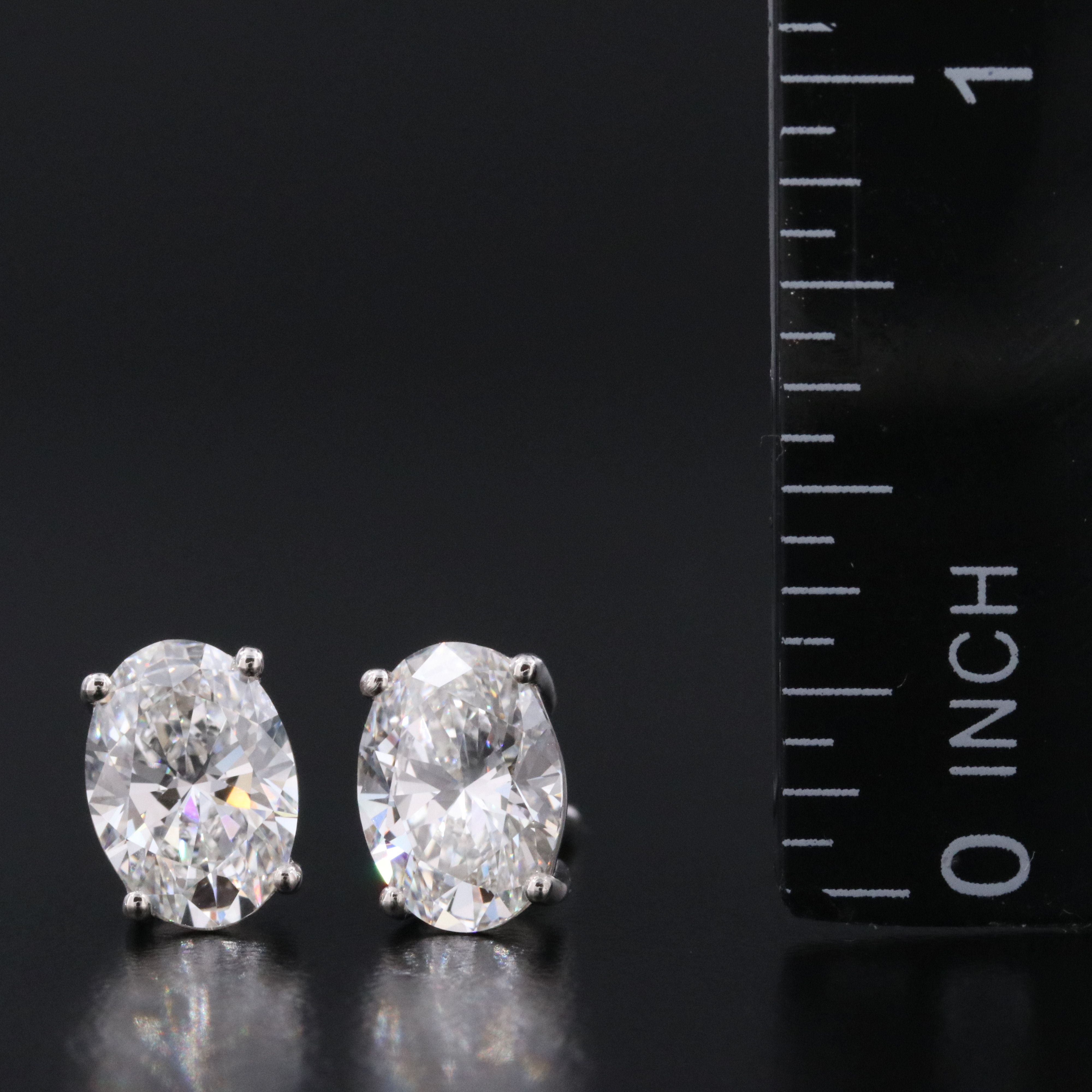 Platinum 3.12 CTW Lab Grown Diamond Solitaire Earrings with IGI Reports