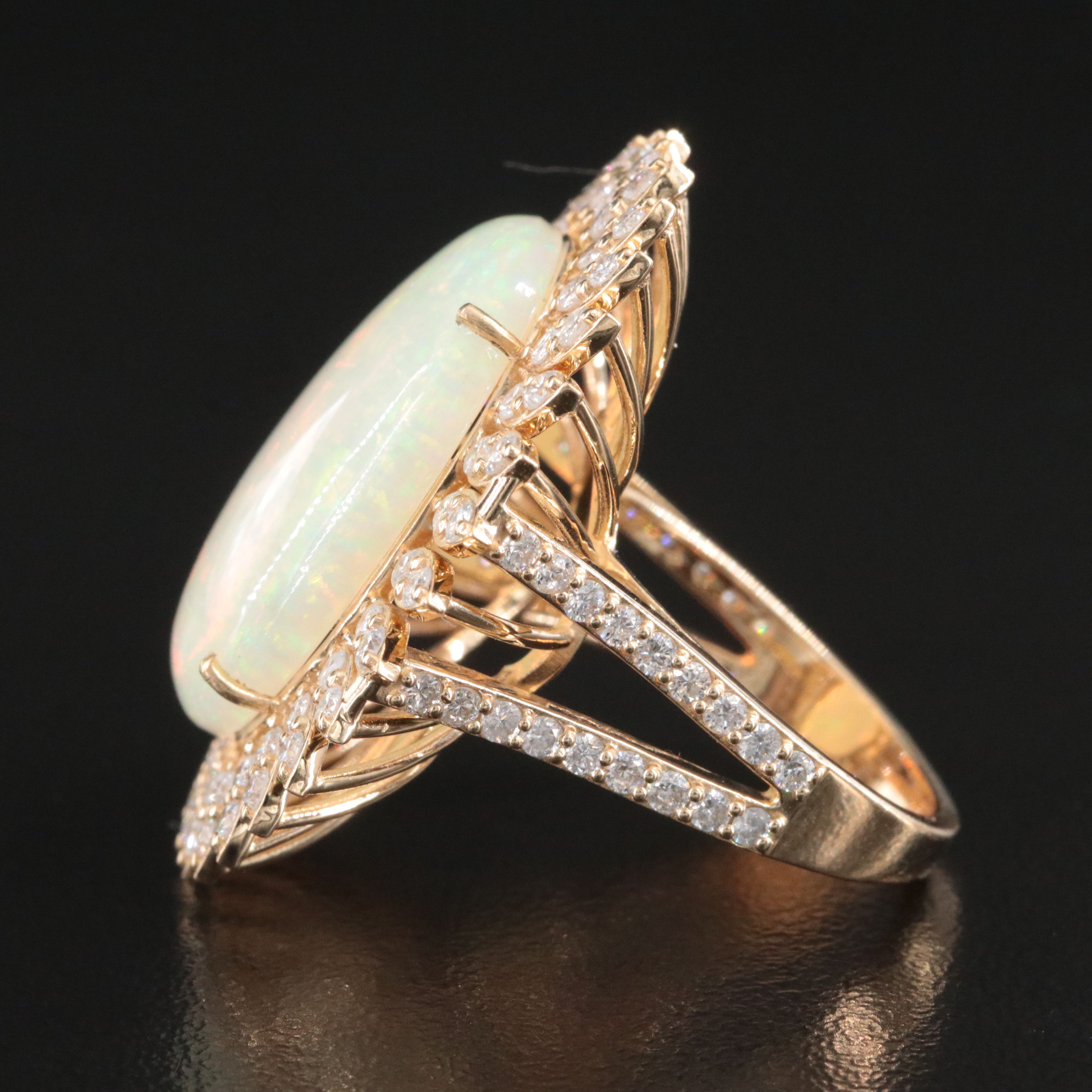 14K 8.68 CTW Opal and 1.53 CTW Diamond Halo Ring
