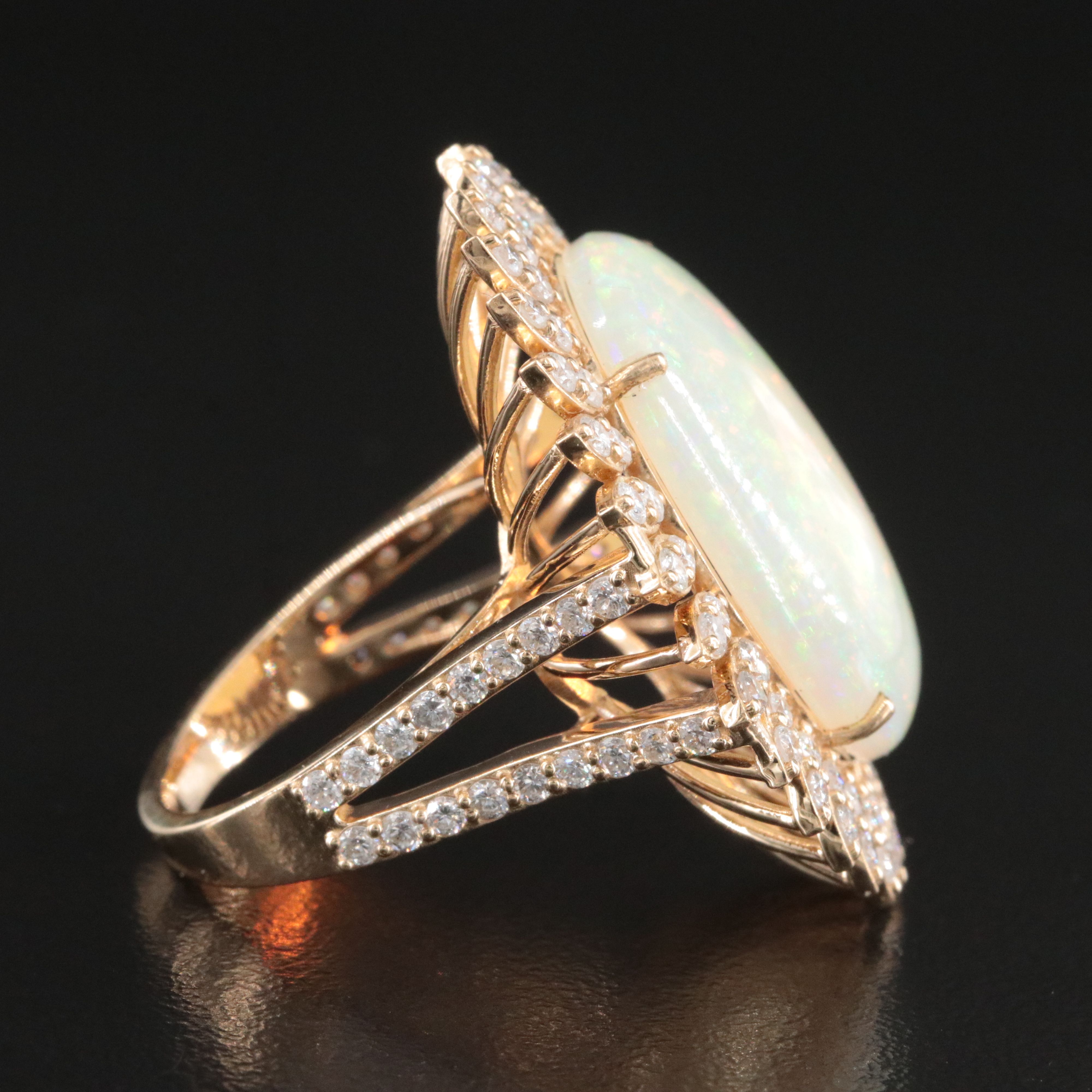 14K 8.68 CTW Opal and 1.53 CTW Diamond Halo Ring