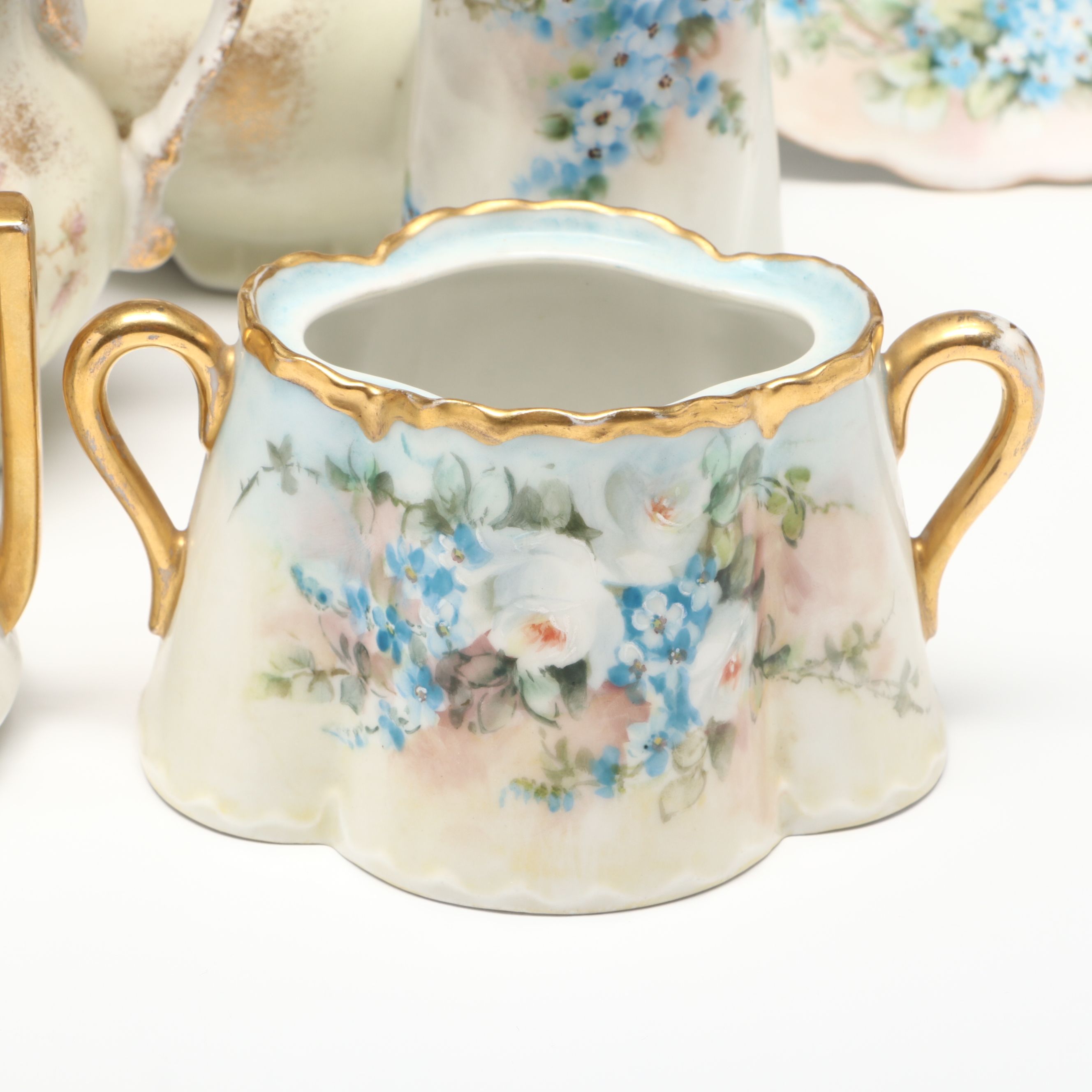 Floral Porcelain Vase, Plates, Creamer and Sugar Bowls
