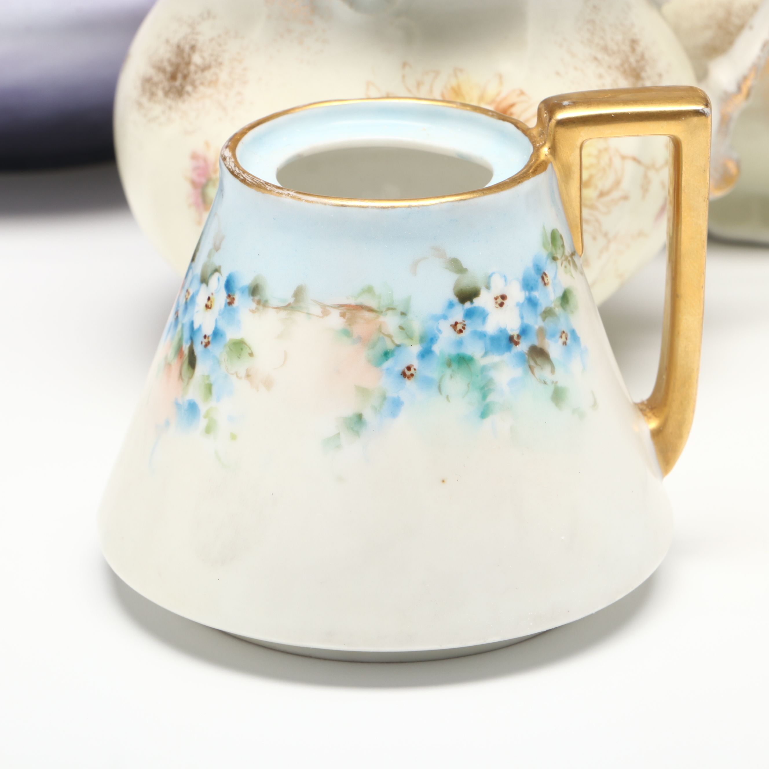 Floral Porcelain Vase, Plates, Creamer and Sugar Bowls