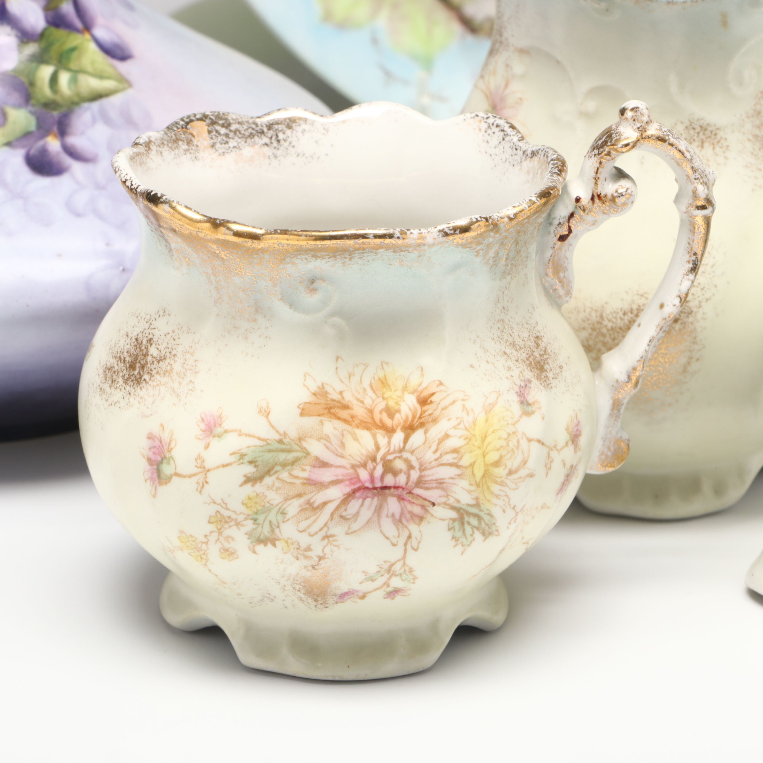 Floral Porcelain Vase, Plates, Creamer and Sugar Bowls