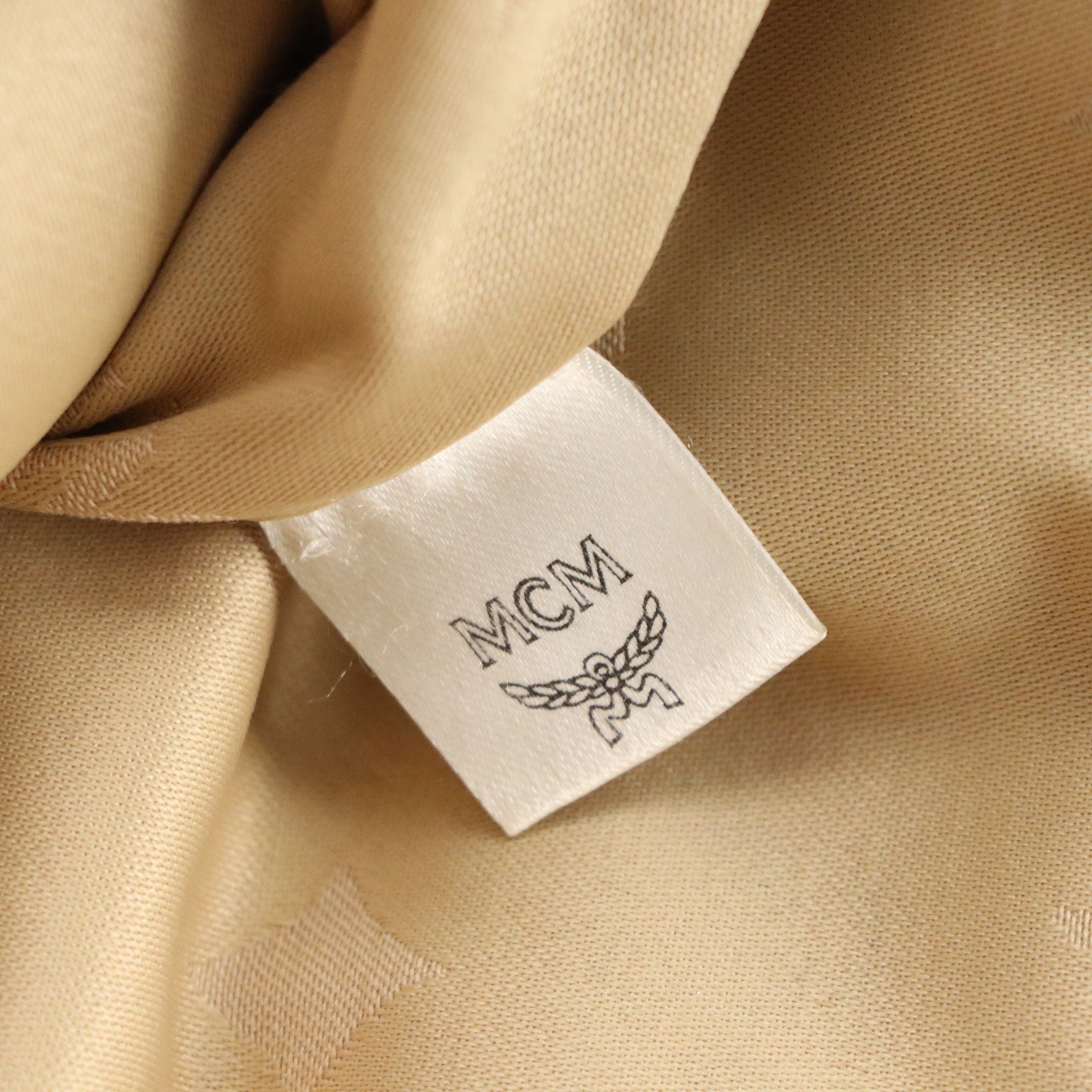 MCM Crossbody Zip Pouch in Denim Blue Cognac Visetos Canvas and Leather