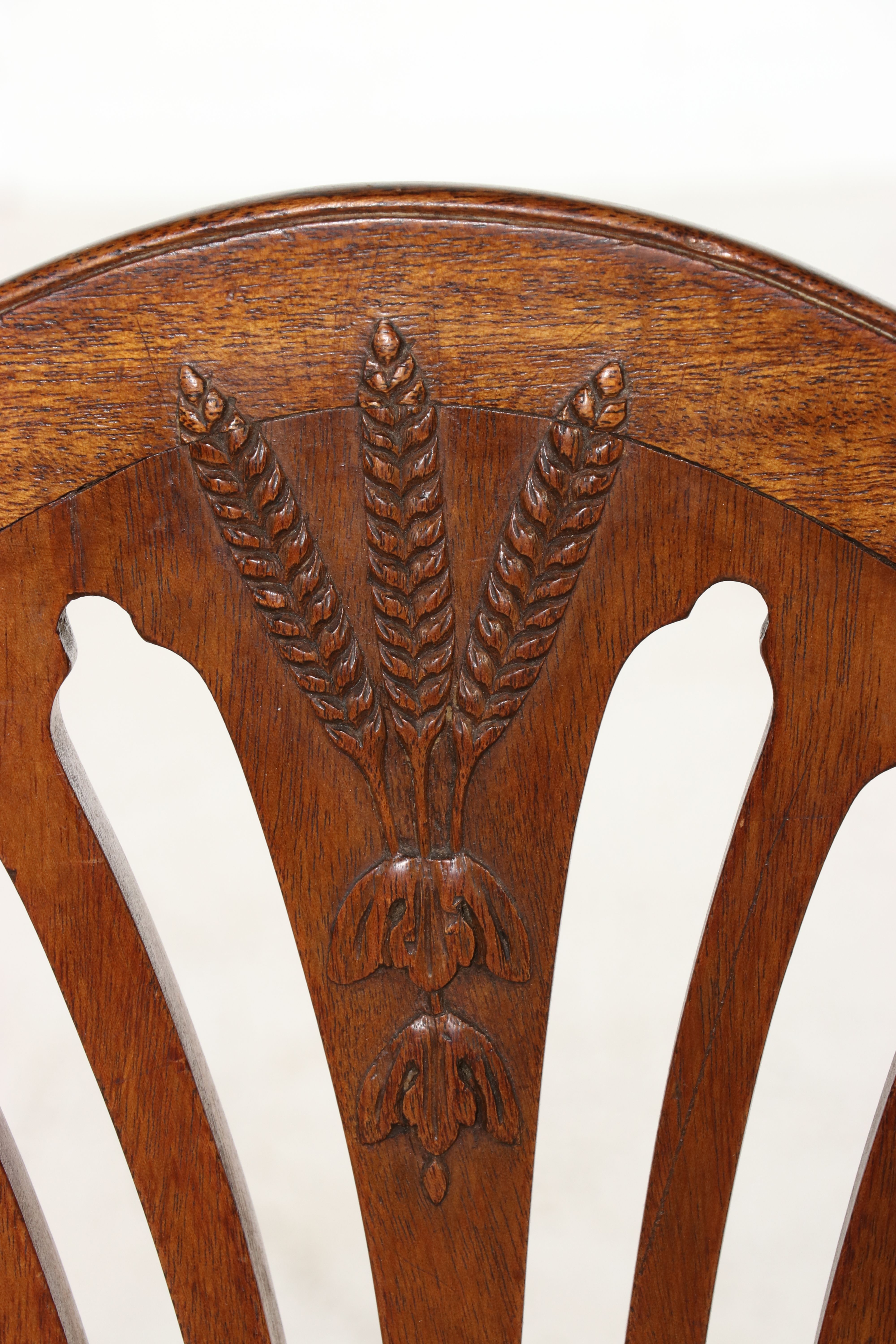 Set of Eight Hepplewhite Style Shield-Back Chairs with Wheat Sheaf Carving