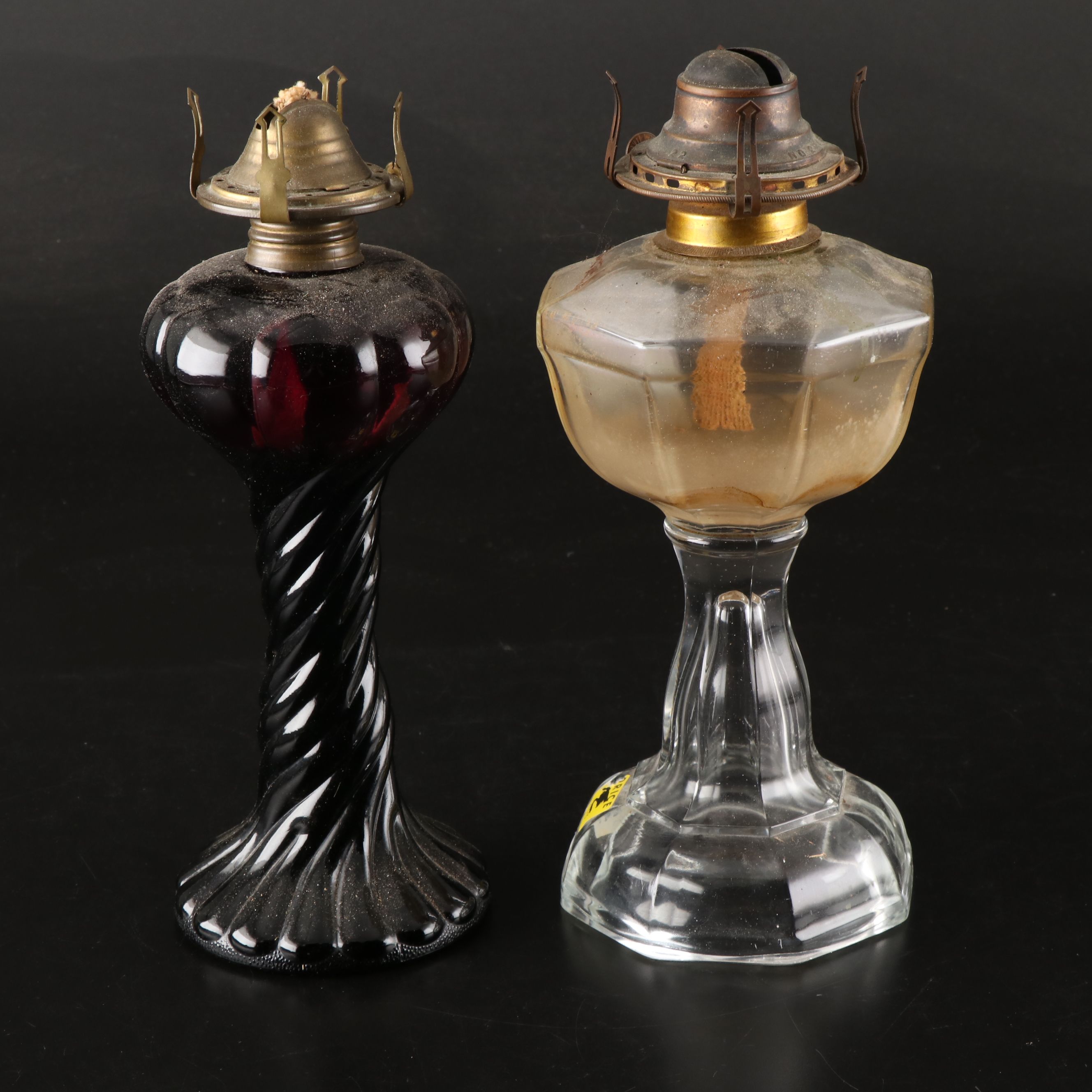 Ruby Spiral Pressed Glass and Eight-Panel Clear Pressed Glass Oil Lamps