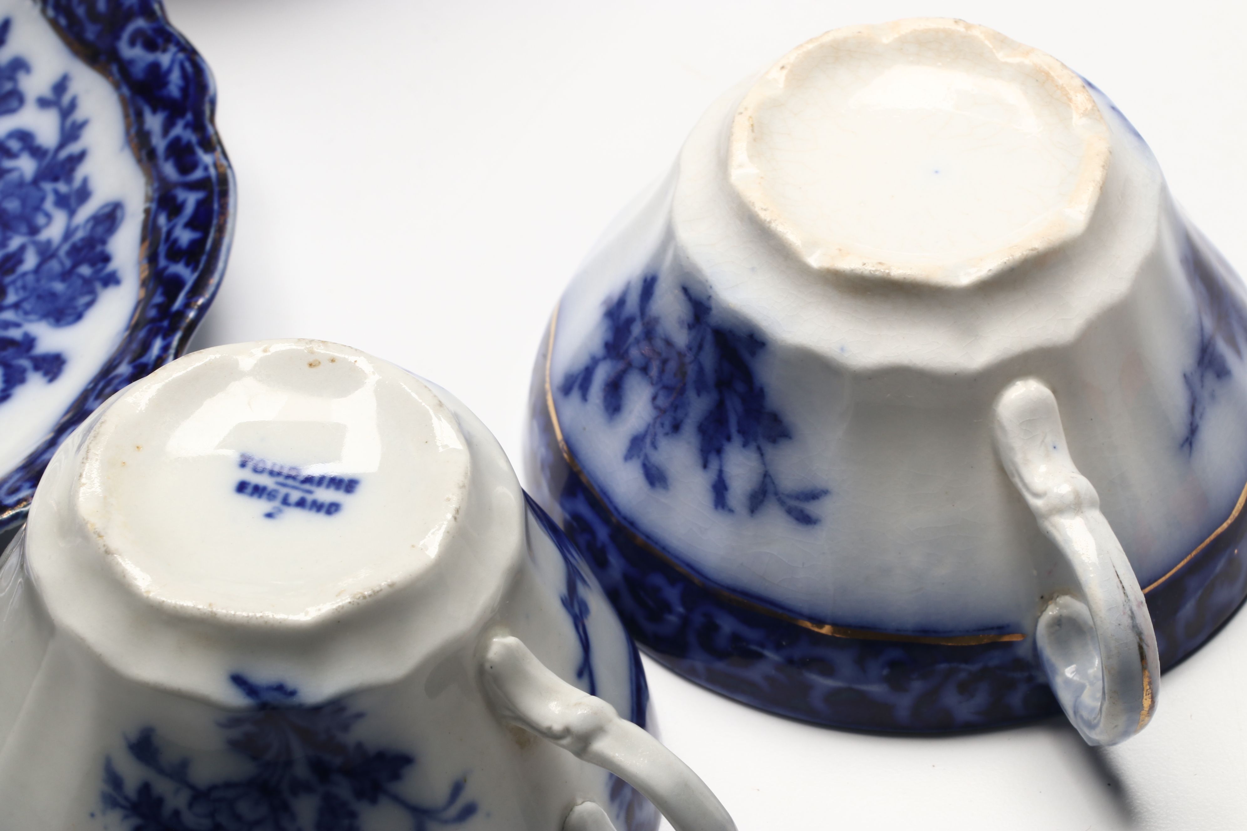 Staffordshire "Touraine Flow Blue" Teacups and Other Gilt Porcelain Tableware