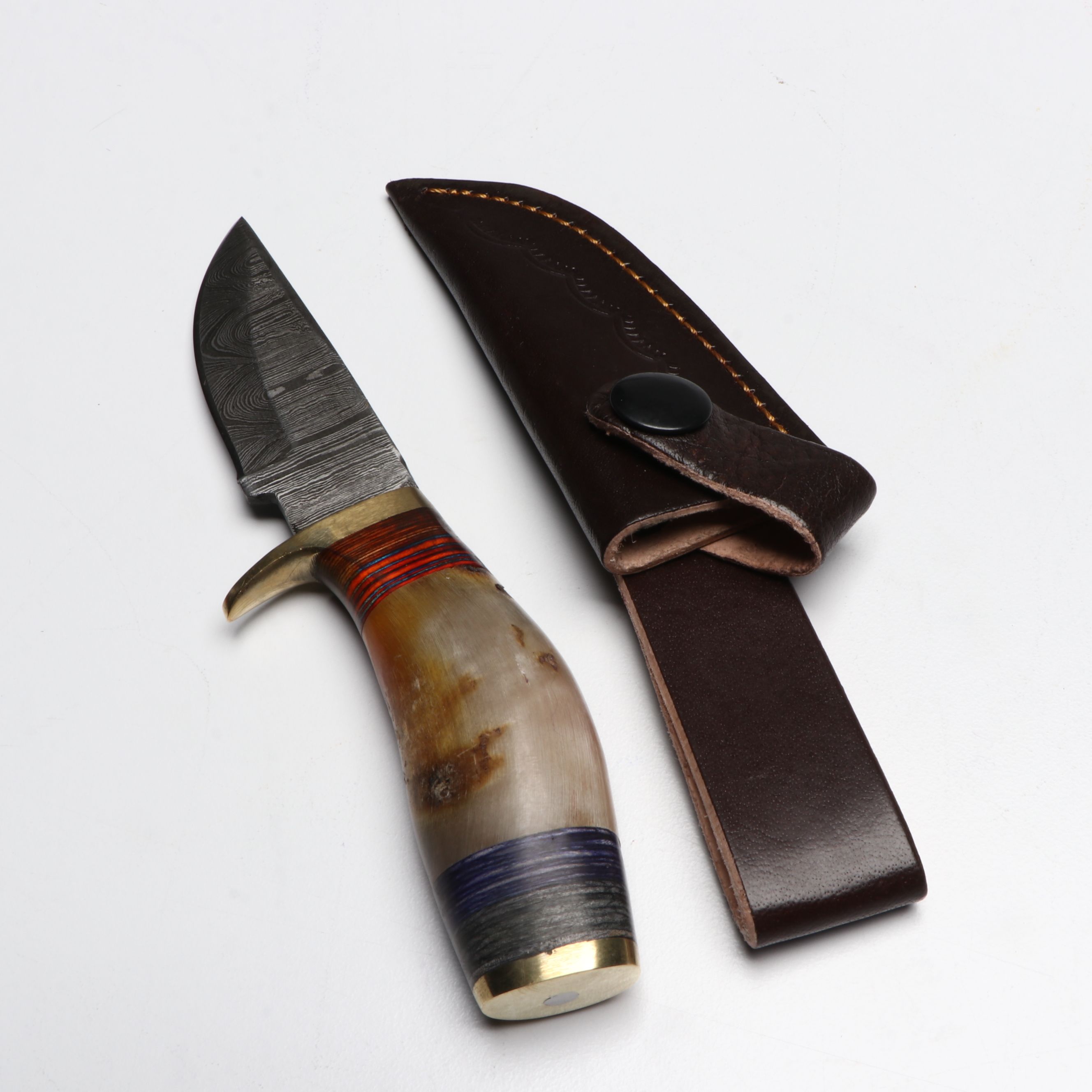 Damascus Steel Skinner and Hunting Knives in Leather Scabbards