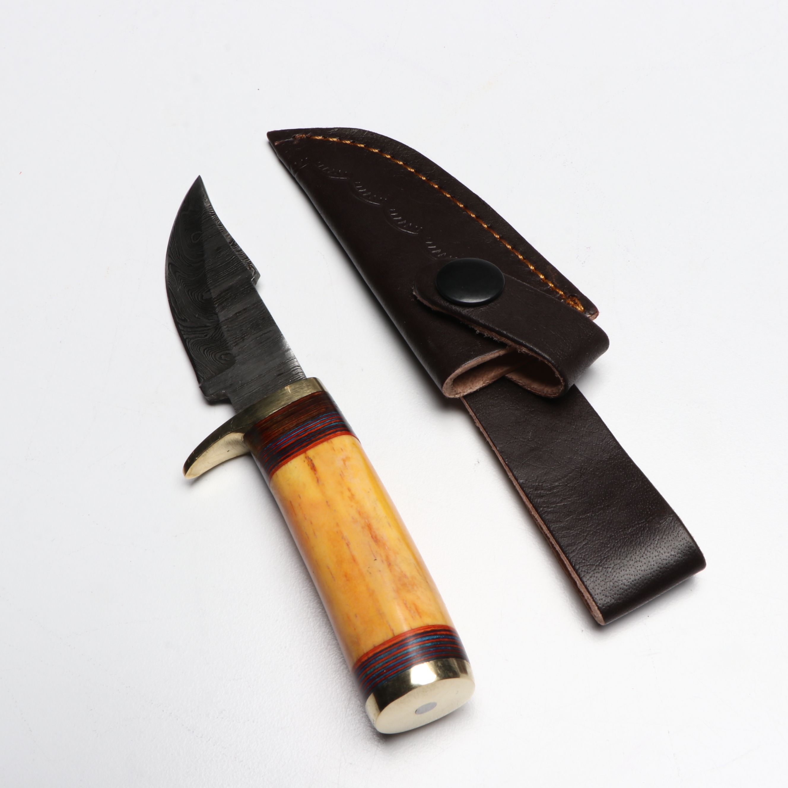 Damascus Steel Skinner and Hunting Knives in Leather Scabbards