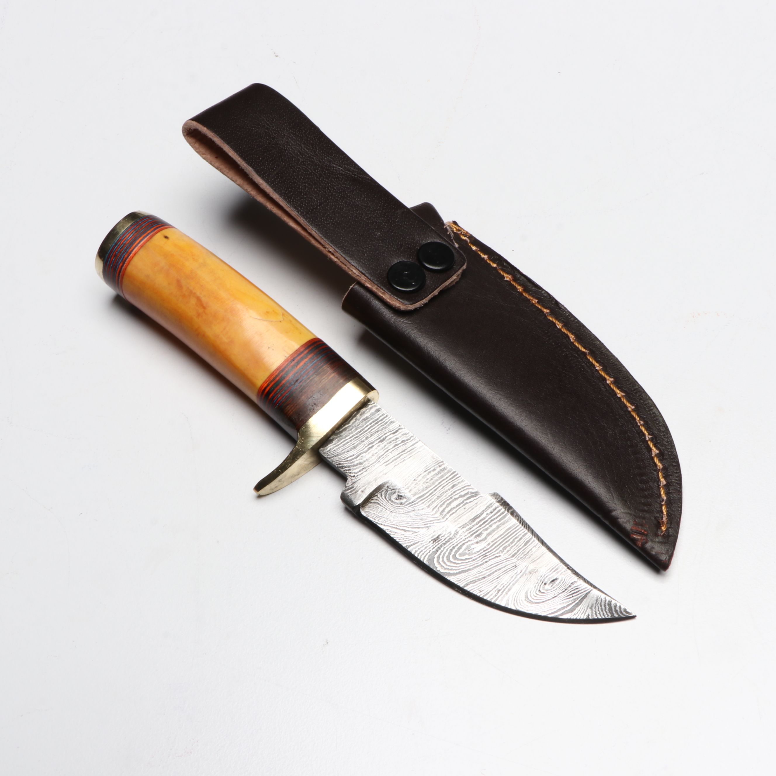 Damascus Steel Skinner and Hunting Knives in Leather Scabbards