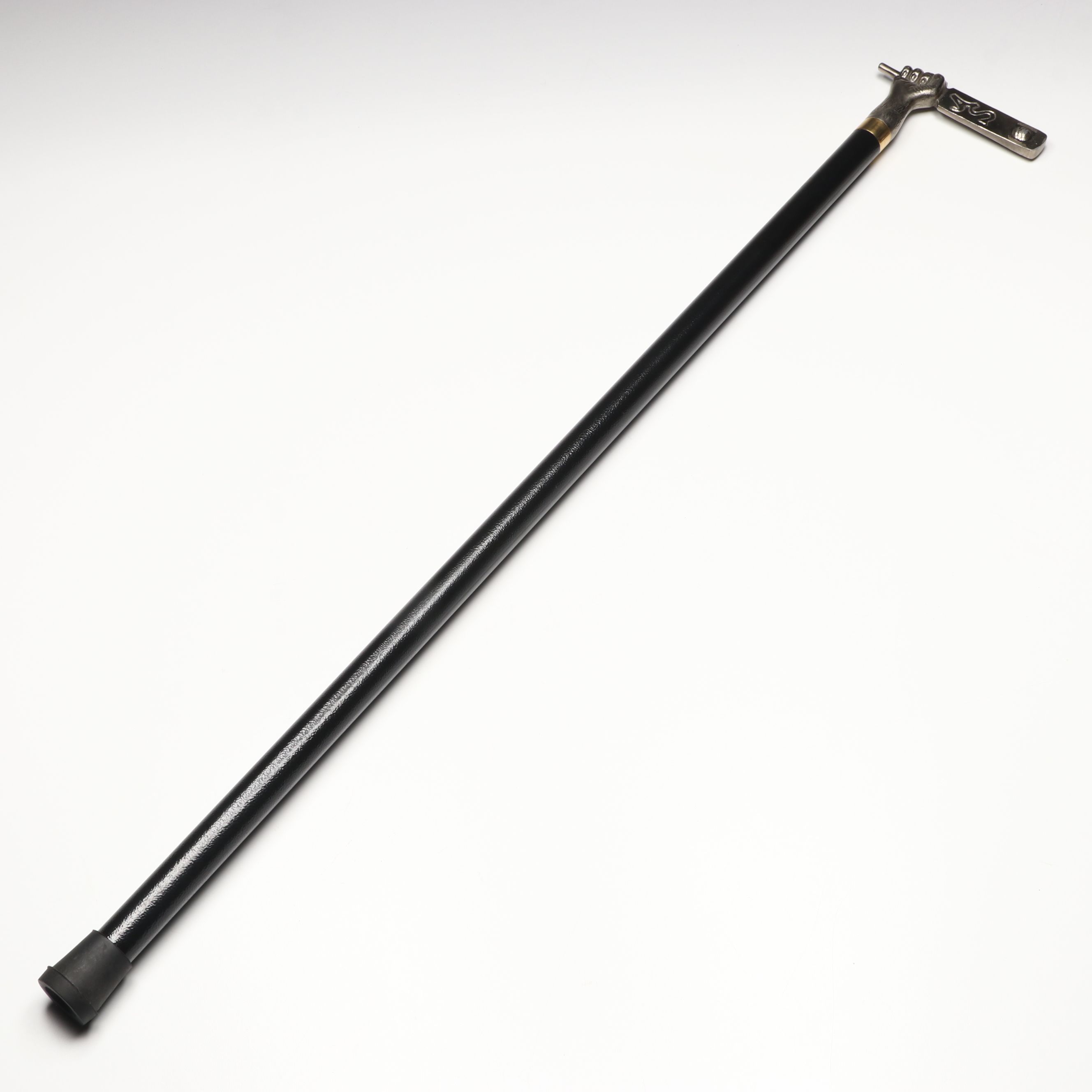 Hand Holding Paddle Handled Sword Cane