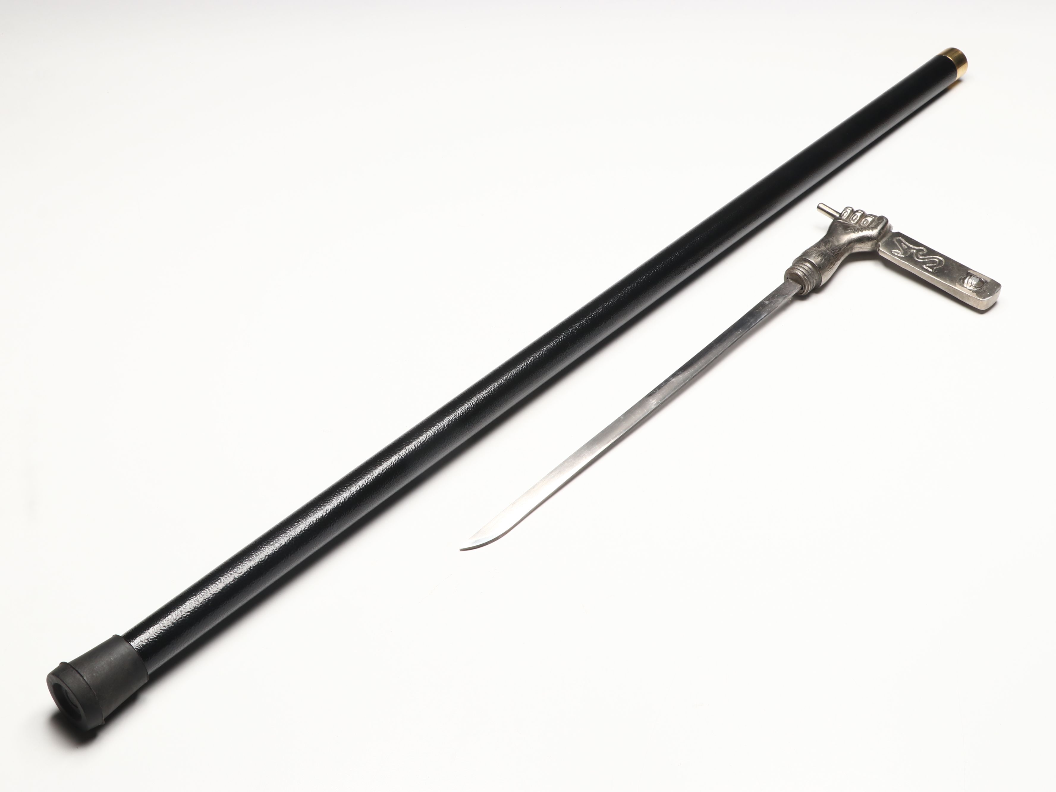 Hand Holding Paddle Handled Sword Cane