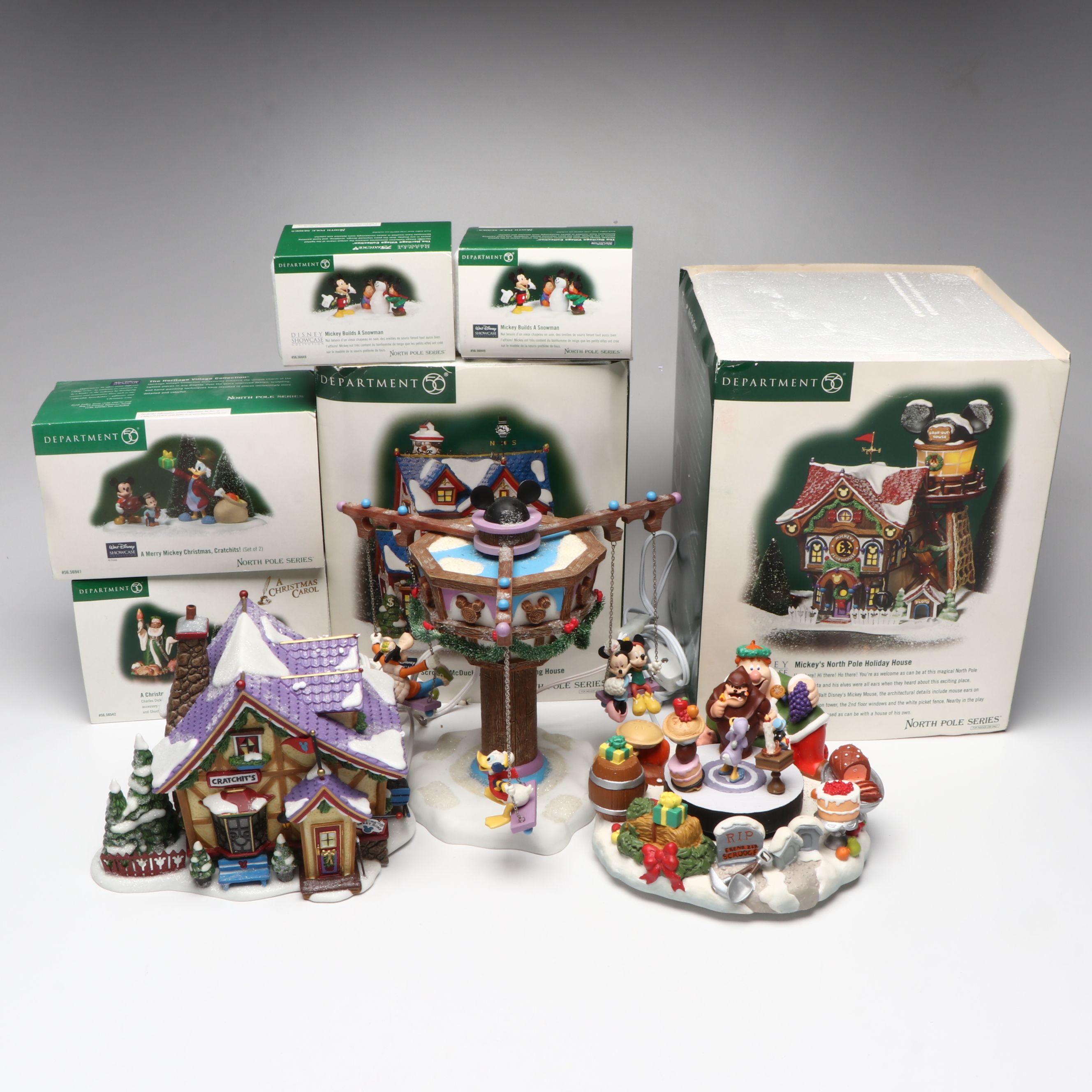 Department 56 Disney Showcase and Christmas Carol Christmas Village Figurines