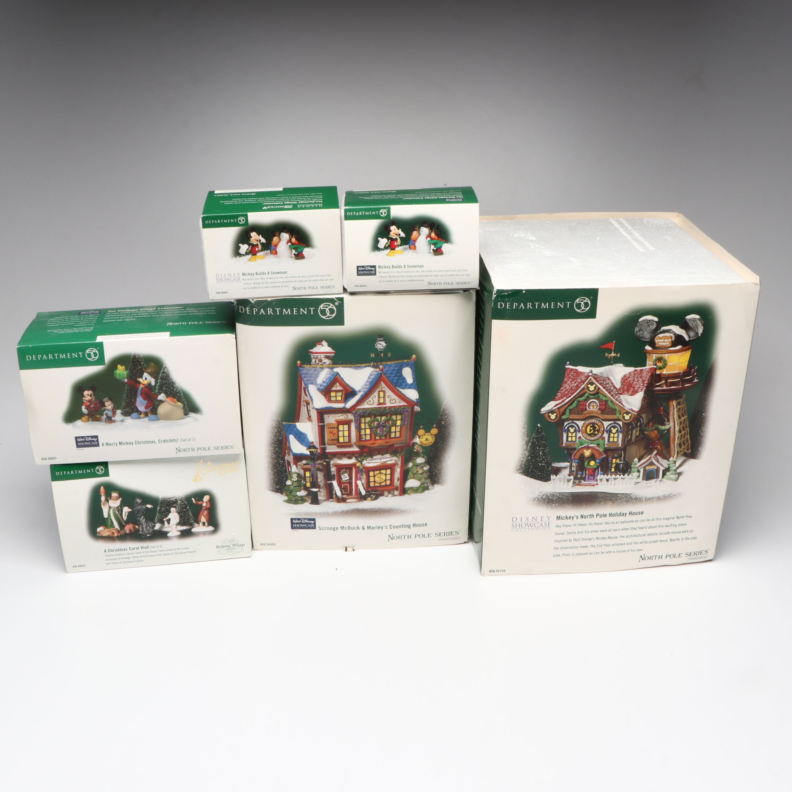 Department 56 Disney Showcase and Christmas Carol Christmas Village Figurines