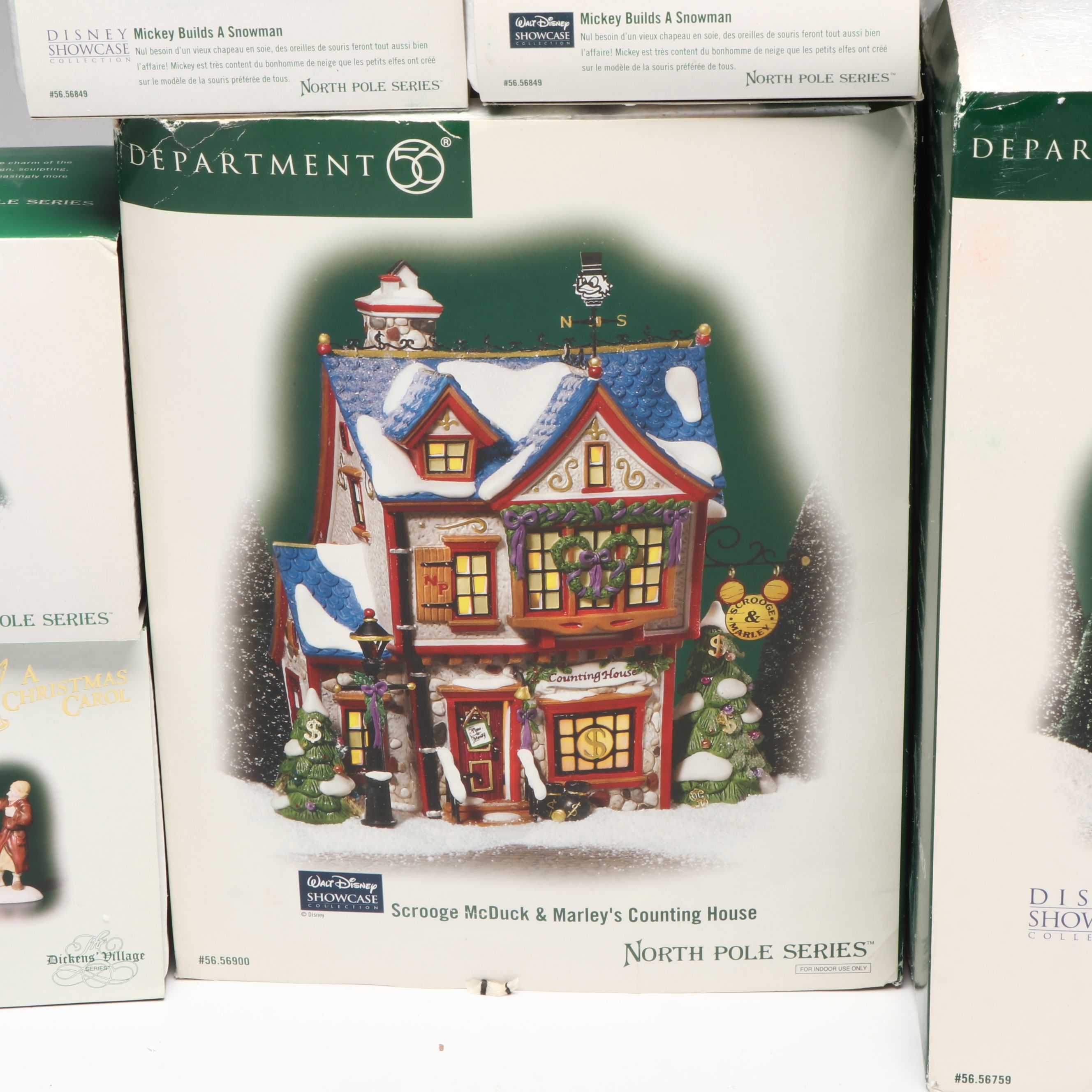 Department 56 Disney Showcase and Christmas Carol Christmas Village Figurines