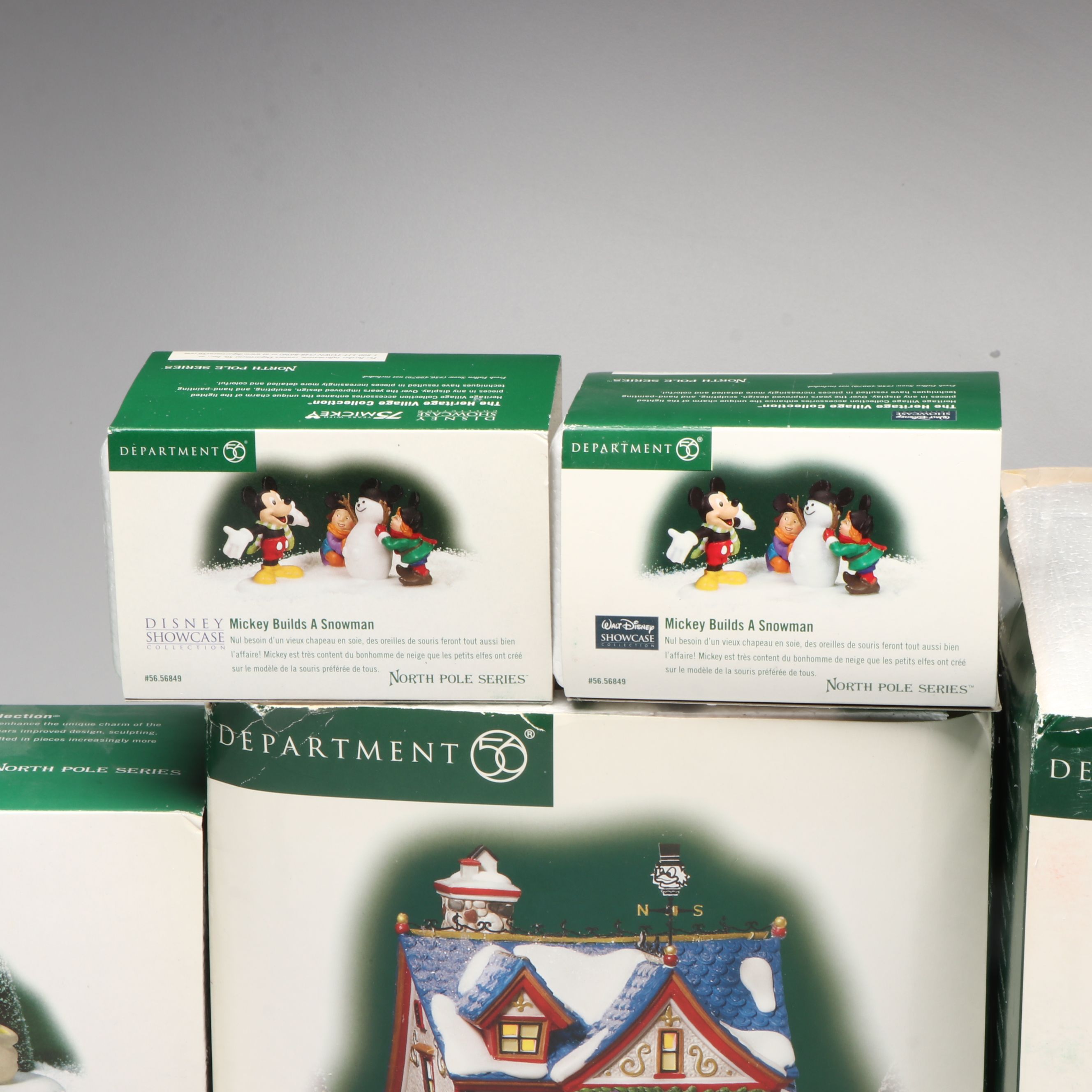 Department 56 Disney Showcase and Christmas Carol Christmas Village Figurines