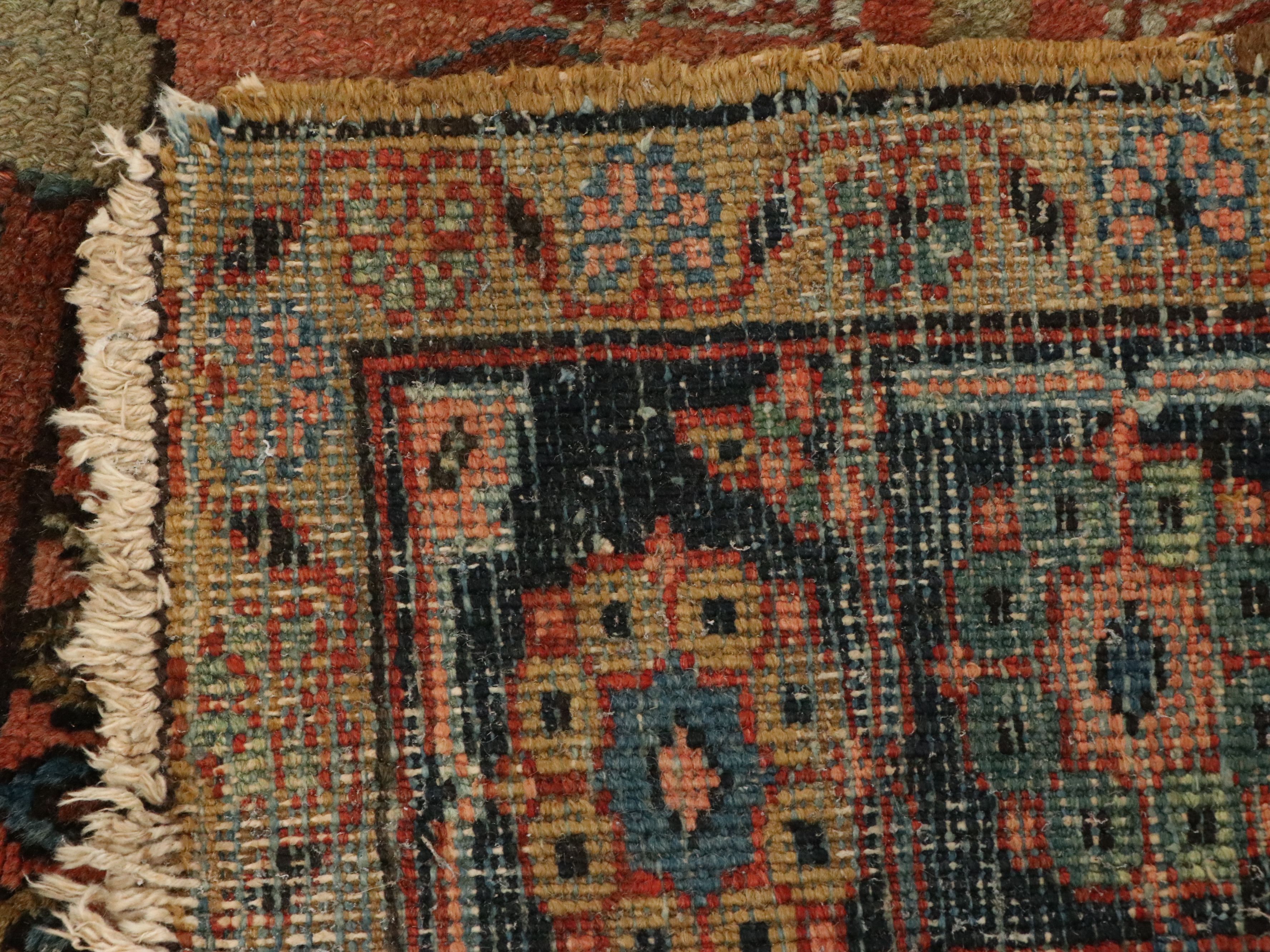 Antique 9' x 11'8 Hand-Knotted Heriz Rug