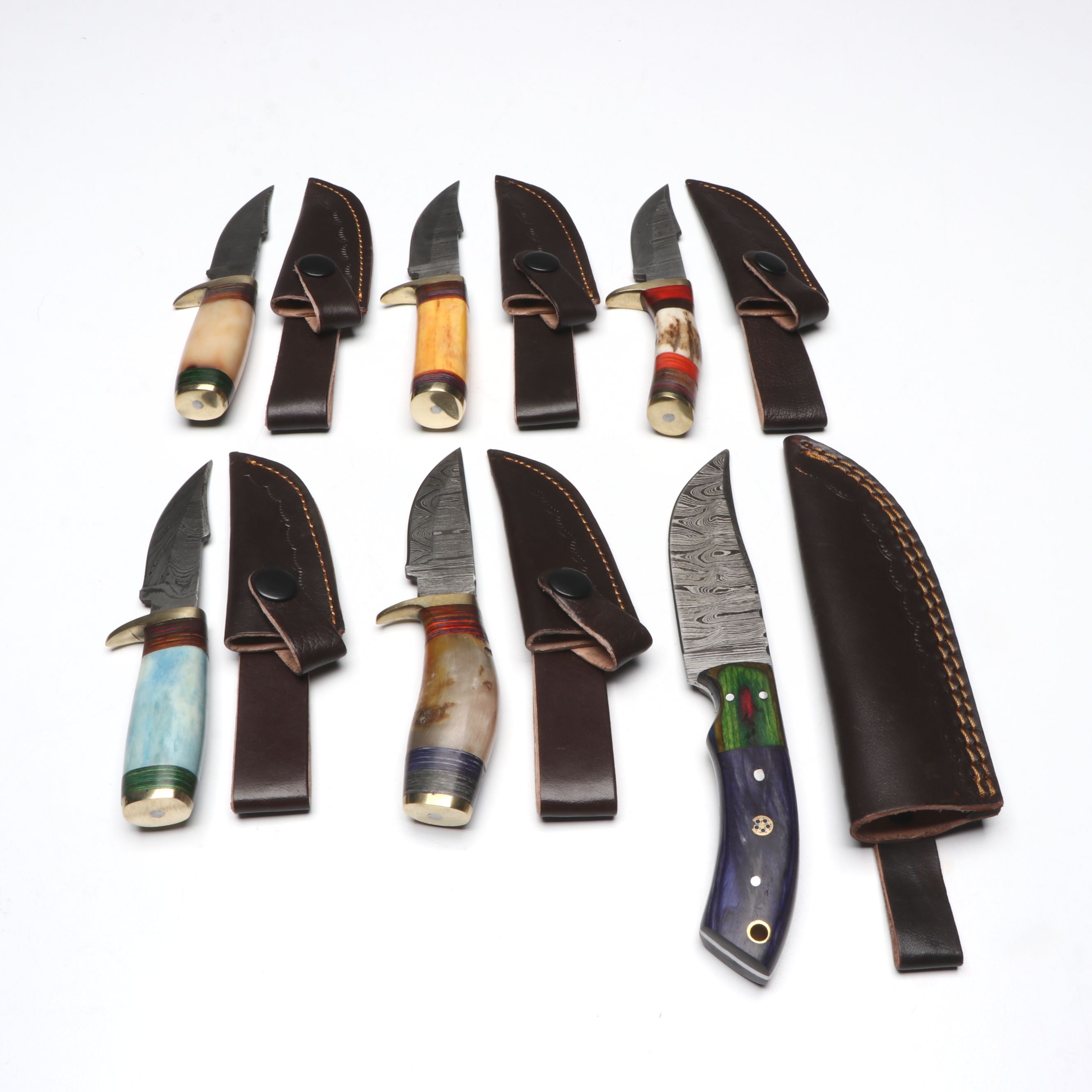 Damascus Steel Skinner and Hunting Knives in Leather Scabbards