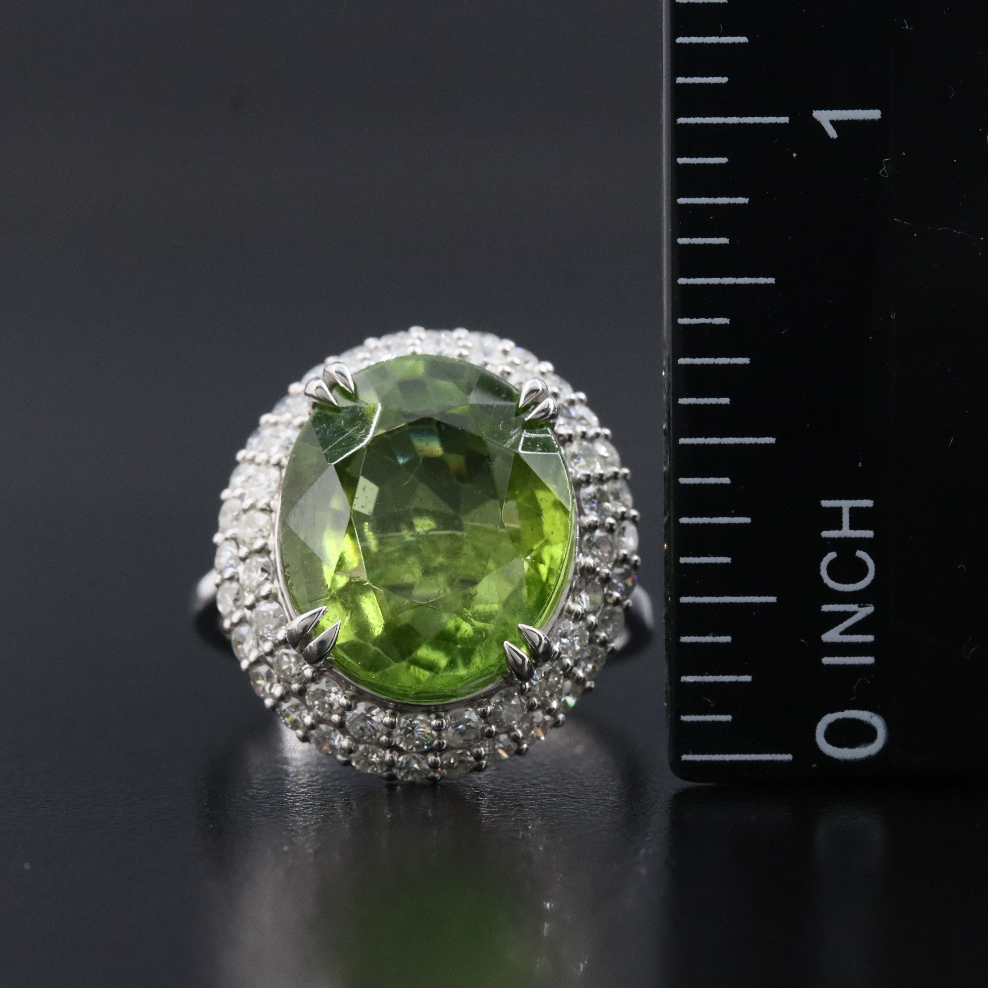 Platinum 8.82 CTW Peridot and 1.11 CTW Diamond Halo ring