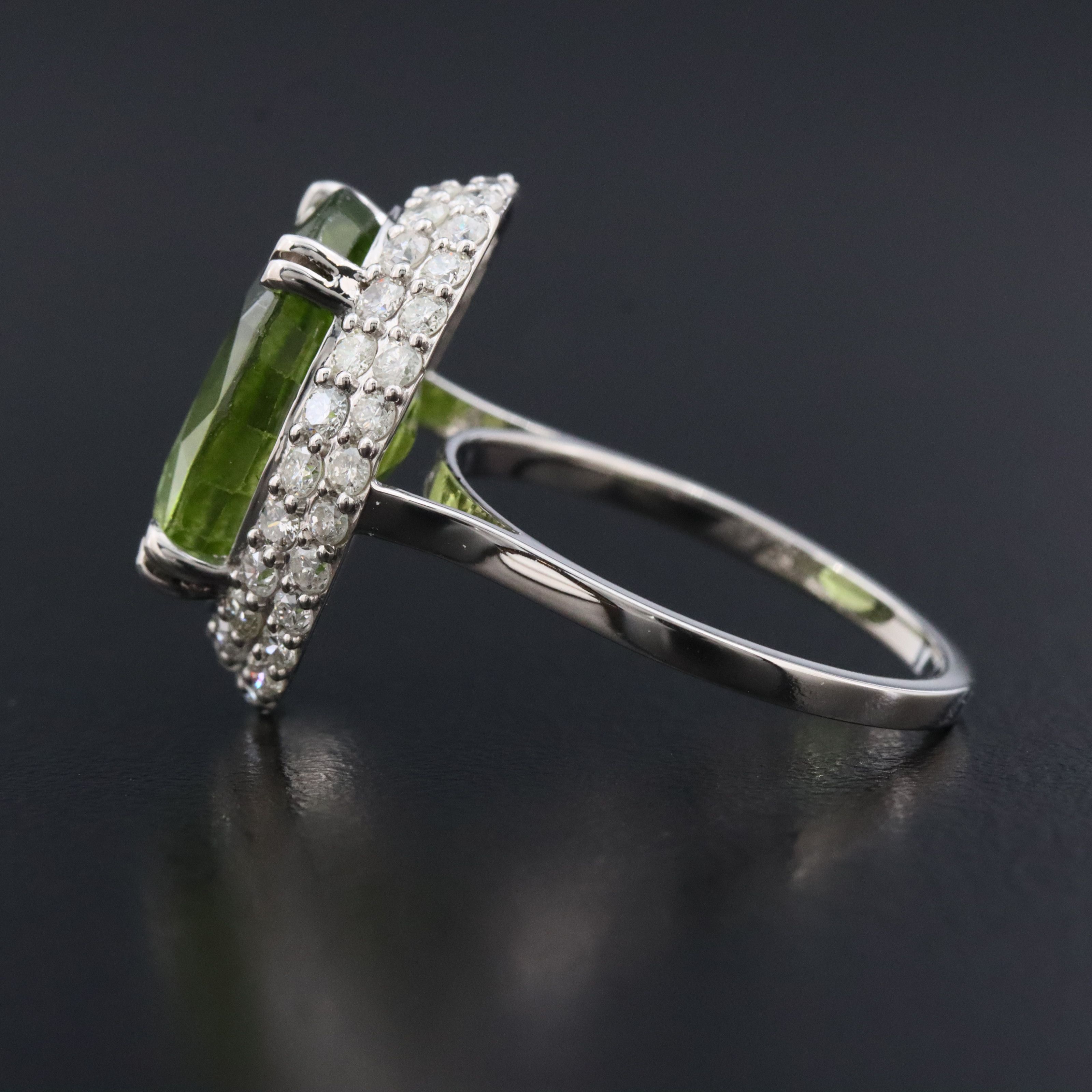 Platinum 8.82 CTW Peridot and 1.11 CTW Diamond Halo ring