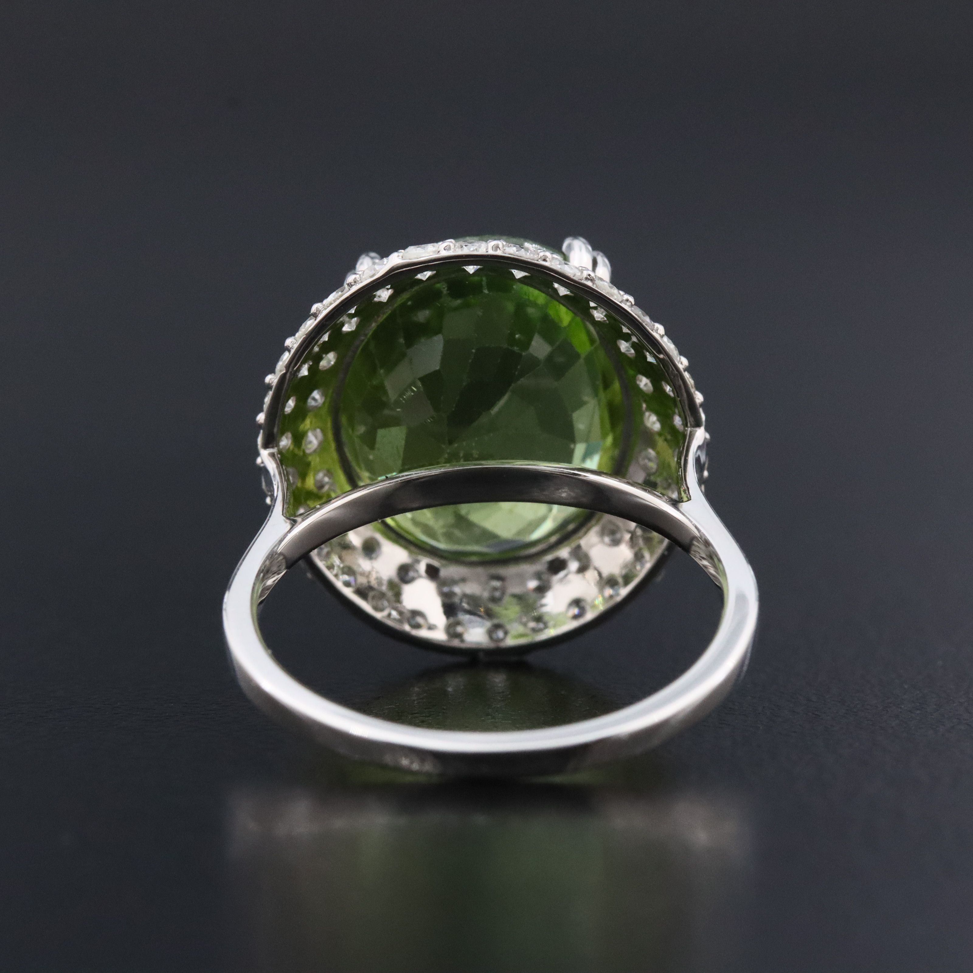 Platinum 8.82 CTW Peridot and 1.11 CTW Diamond Halo ring