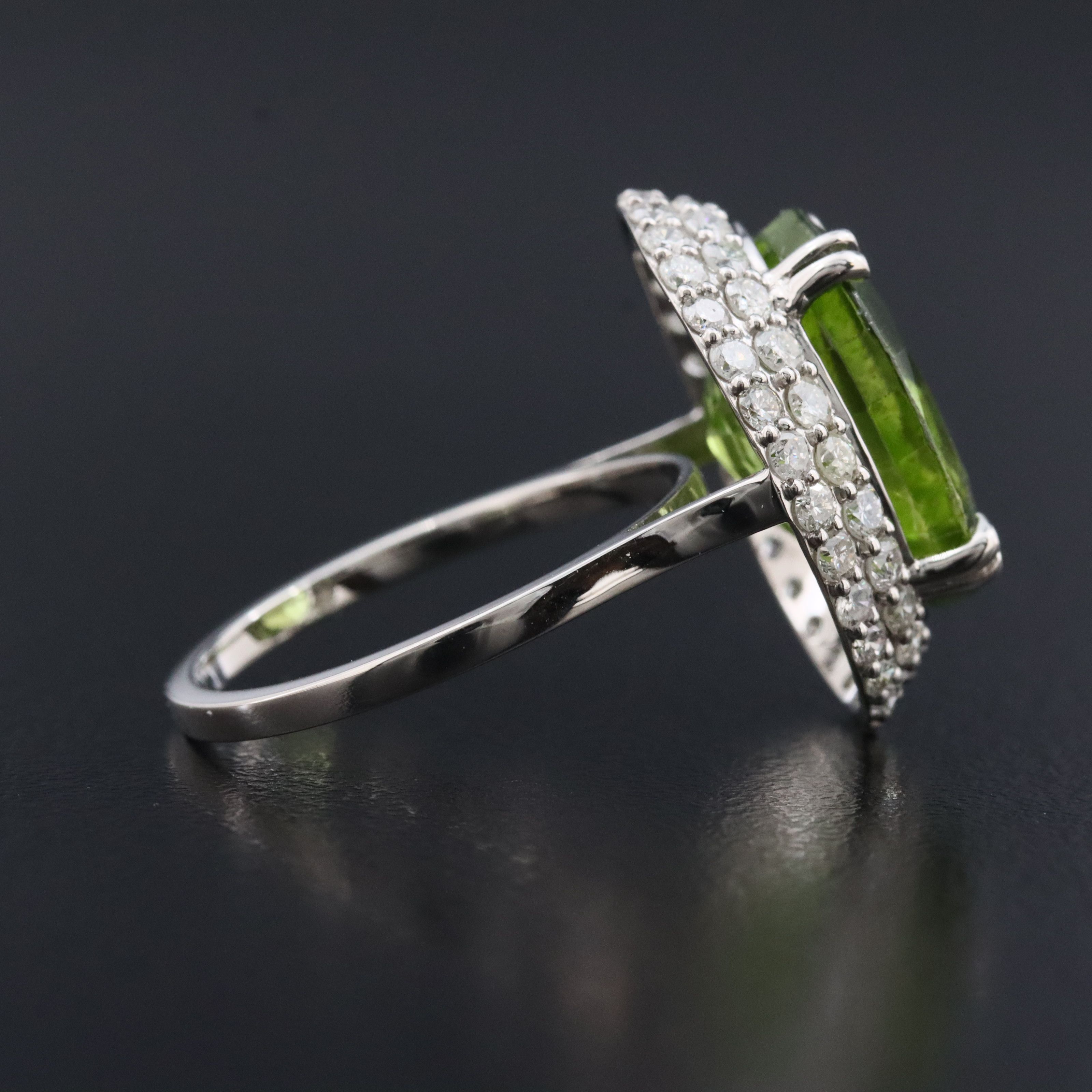 Platinum 8.82 CTW Peridot and 1.11 CTW Diamond Halo ring