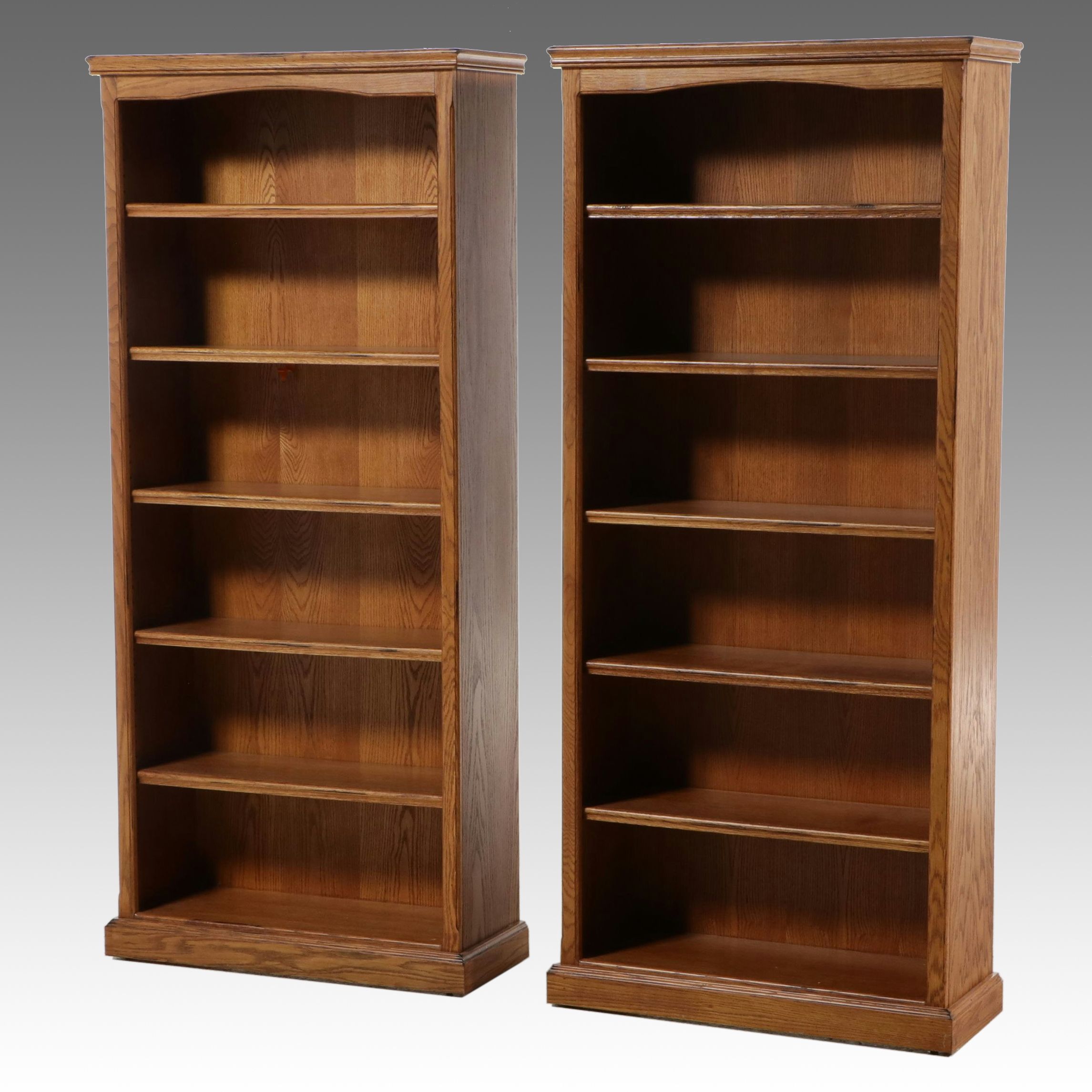 Pair of Oak Veneer Open Bookcases with Arched Aprons