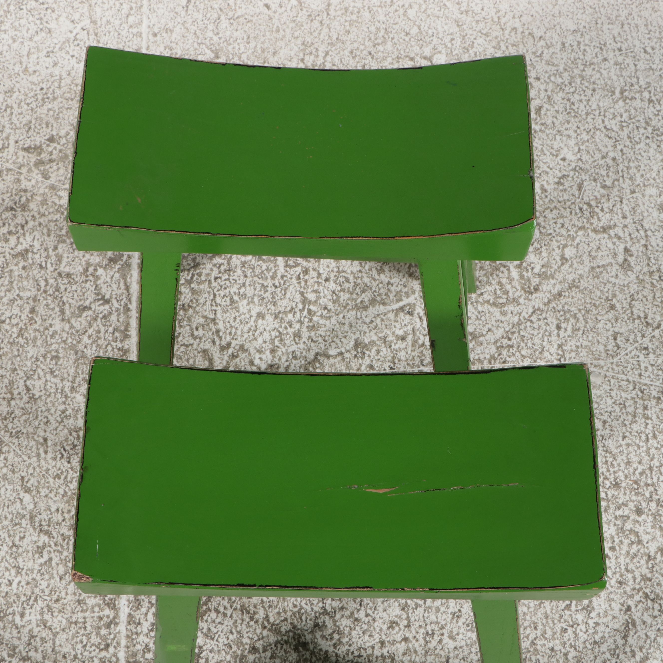 Pair of Asian-Style Green Painted Saddle Stools