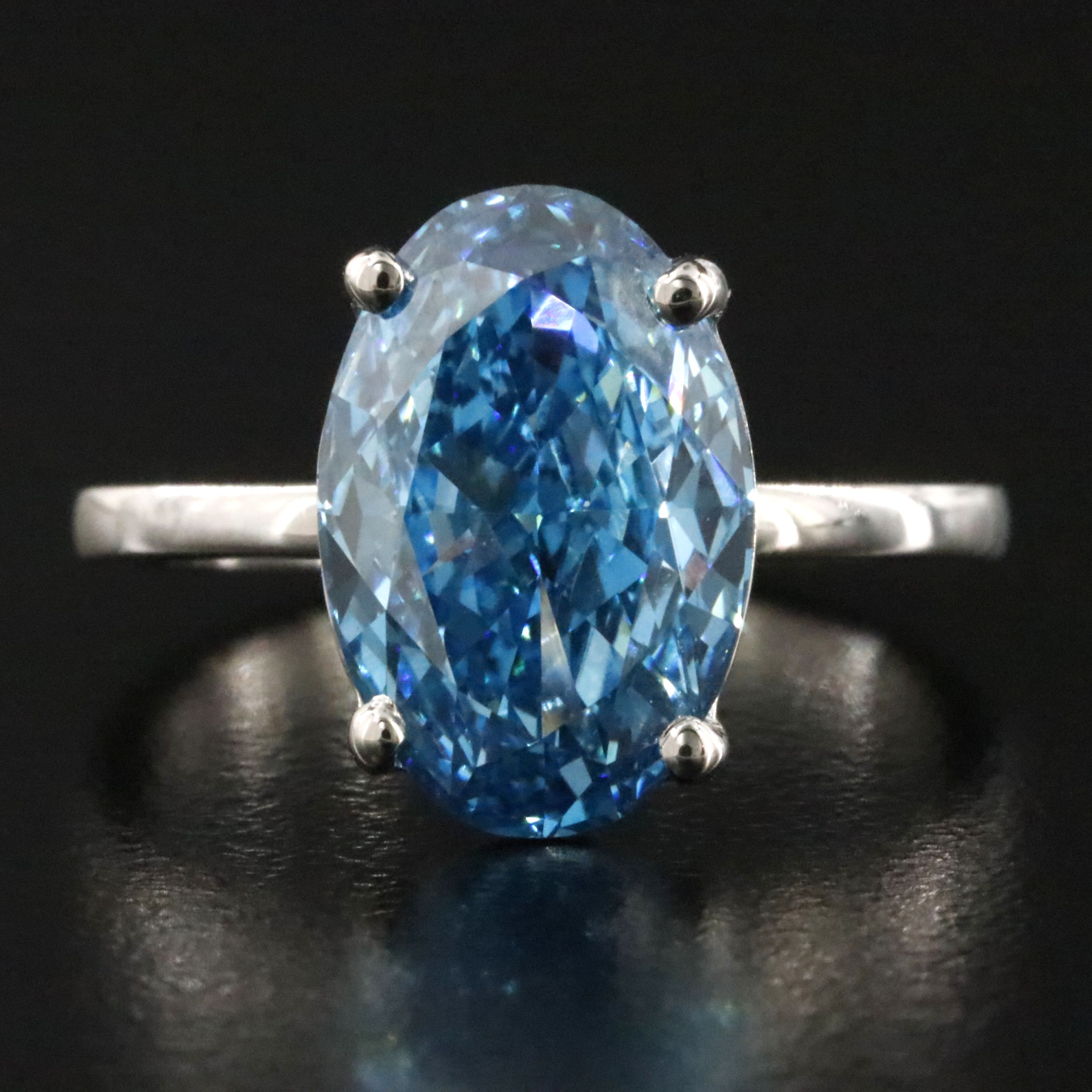Platinum 4.01 CT Lab Grown Fancy Vivid Blue Diamond Ring with IGI Report