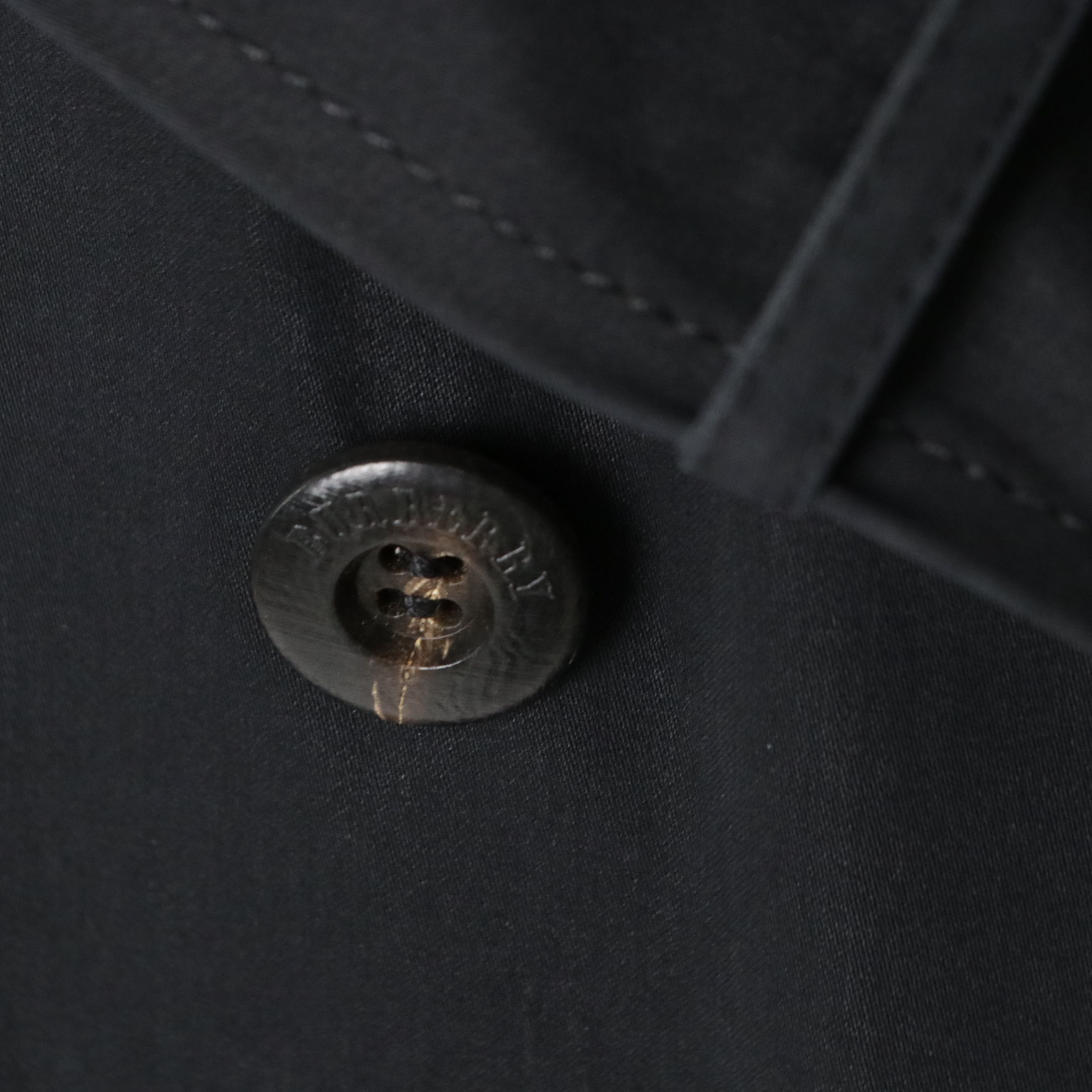 Burberry London Double-Breasted Trench Coat in PU Coated Cotton