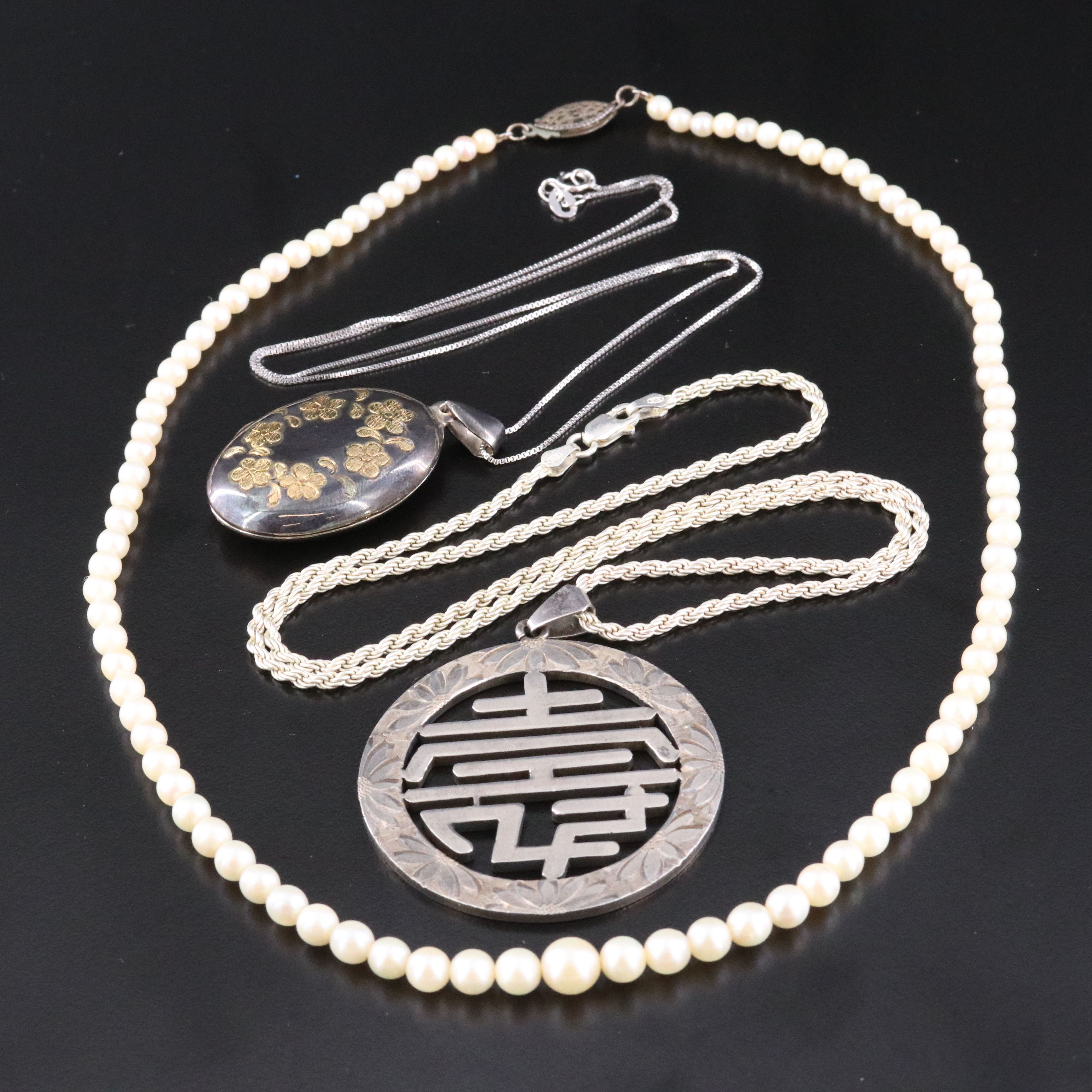 Sterling and 950 Silver Necklaces Featuring Graduated Pearl Necklace