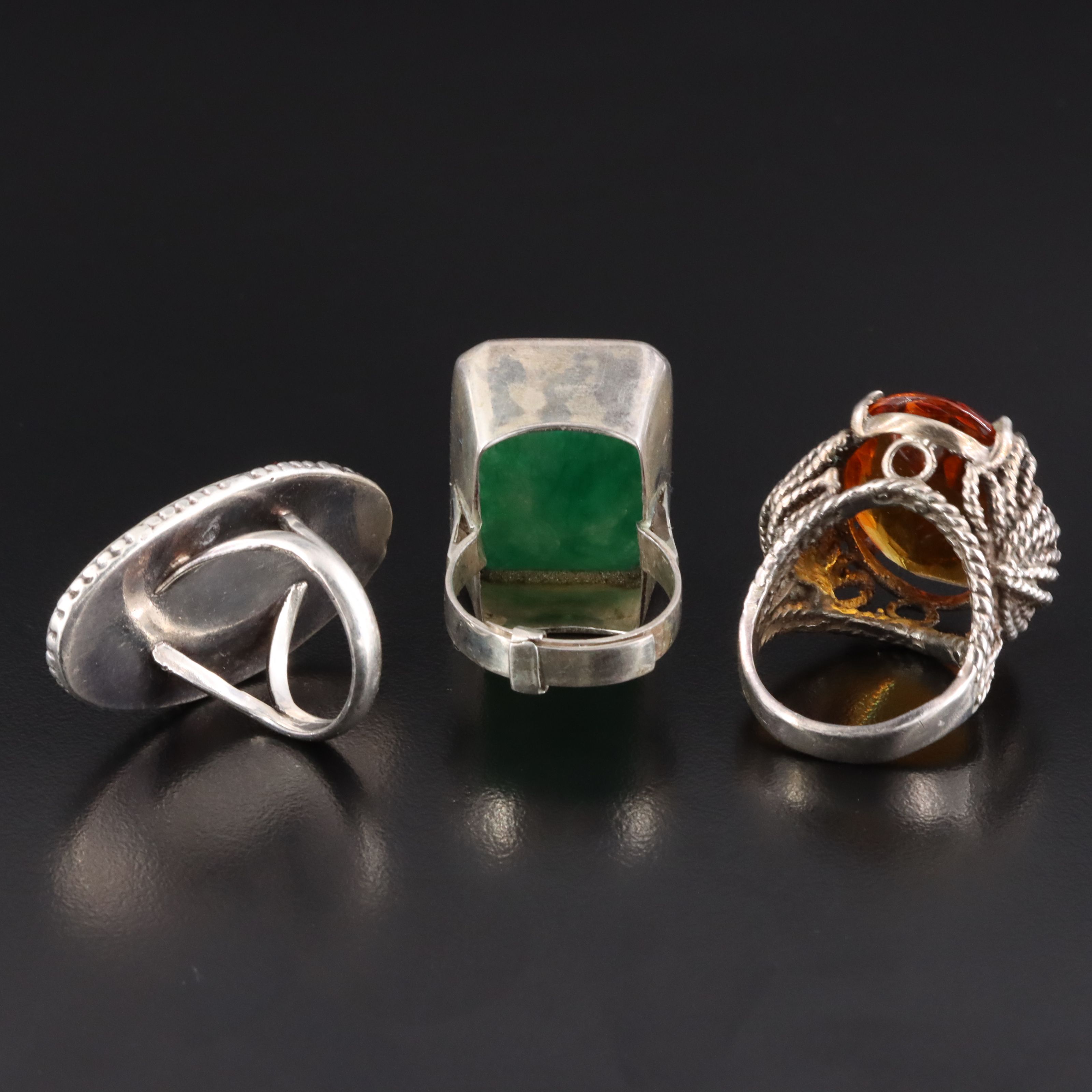 Sterling Rings Featuring Mother of Pearl, Horn, and Quartzite
